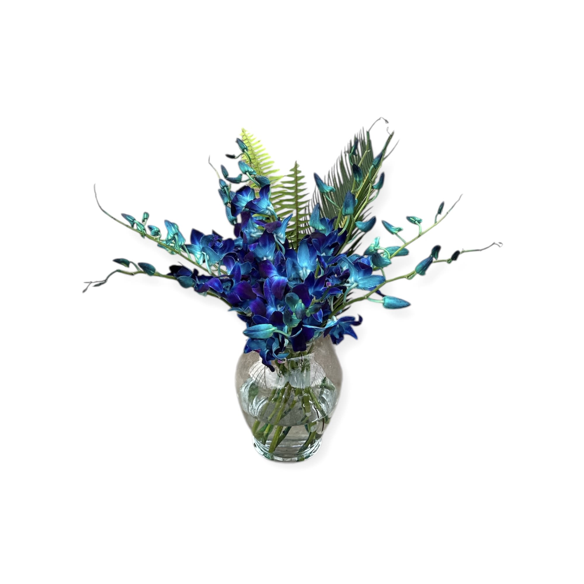 Blue orchid arrangement in a clear glass vase