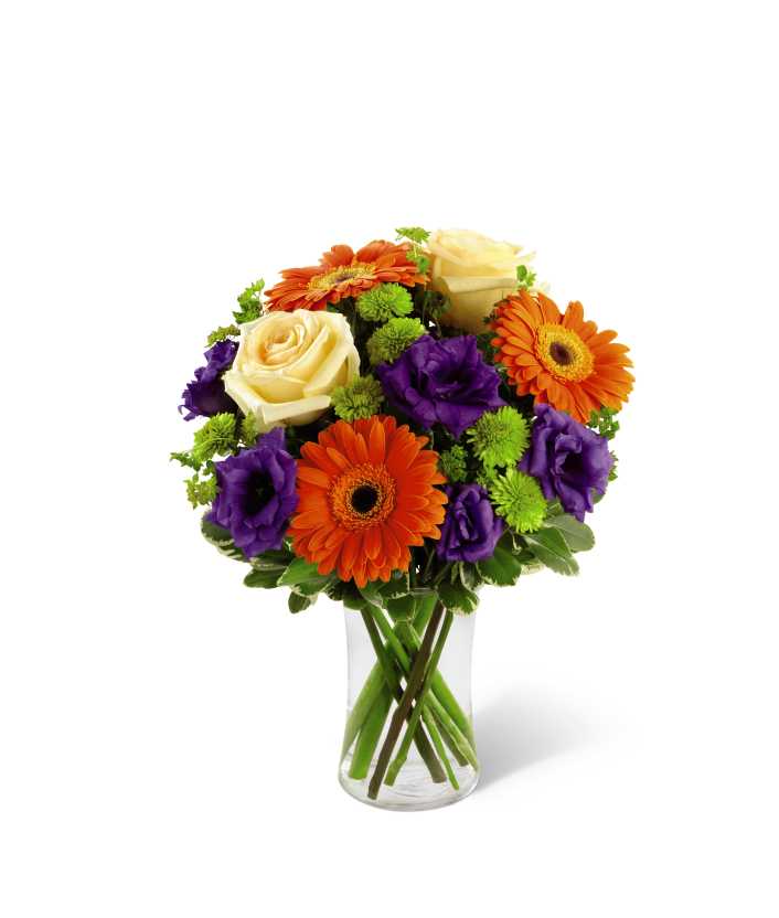 Rays of Solac - The FTD Rays of Solace Bouquet is a cheerful burst of color to extend your deepest sympathies. Yellow roses, orange gerbera daisies, purple lisianthus/daisies/alstroemeria, green button poms and a mix of vibrant greens are beautifully arranged in a clear glass gathering vase to create a warm bouquet expressing hope with every colorful bloom.