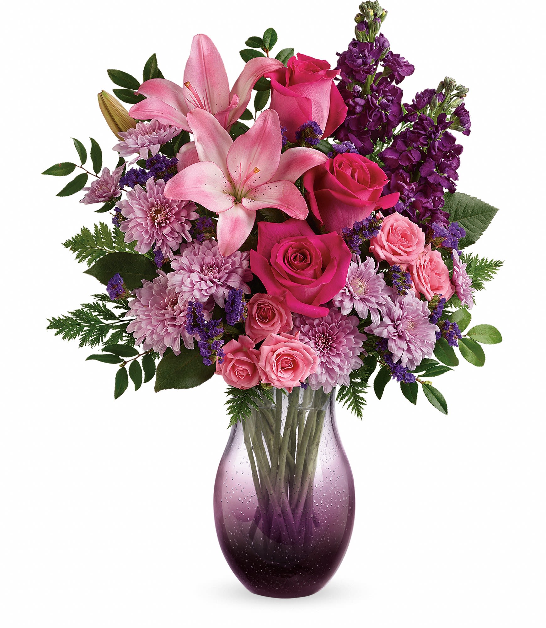Teleflora's All Eyes On You Bouquet - Give mom a memory she'll enjoy for years to come: a hot pink bouquet delivered in this breathtaking, hand-blown bubble glass vase in gorgeous ombre shades of purple. Approximately 15 1/2" W x 20" H 