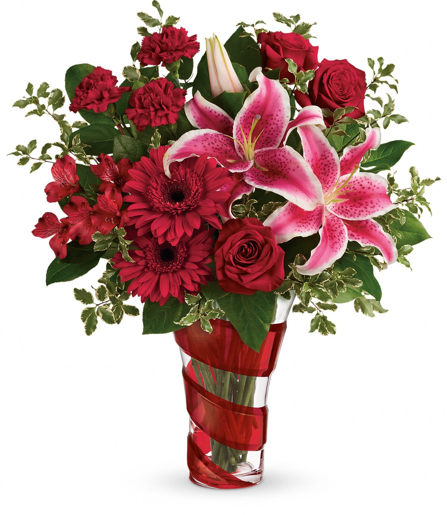 Red roses and pink lilies in a clear vase with red ribbon