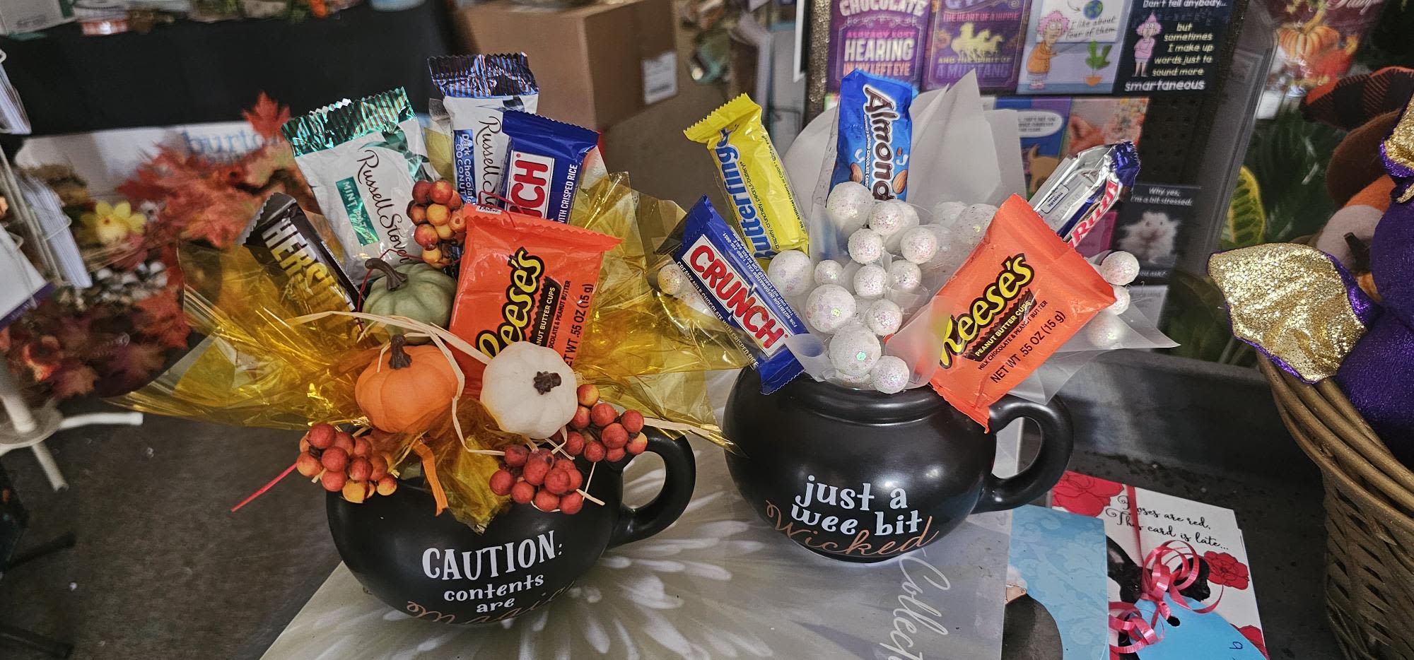 Double Trouble Candy Mug - These fun assorted styles of cauldron like mugs filled with festive decor and just enough candy to indulge in!