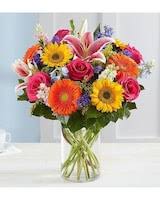 Garden Pathway - Delphinium, sunflowers, roses, lilies, gerberas, all bright and beautiful in this fun bouquet