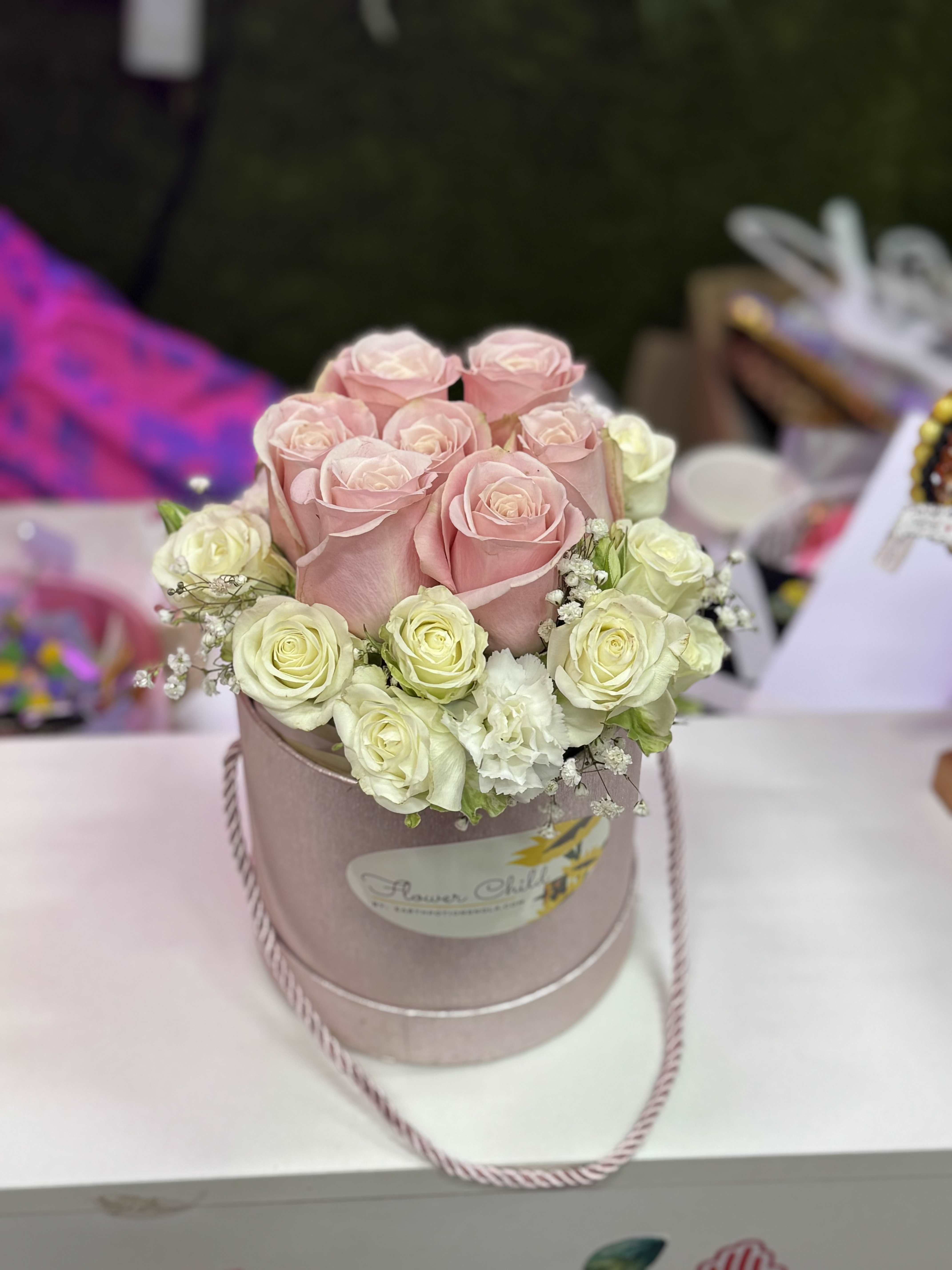 MINI BLOOM BOX - PINK ROSES AND FILLER FLOWERS ARRANGED IN A BLOOM BOX 