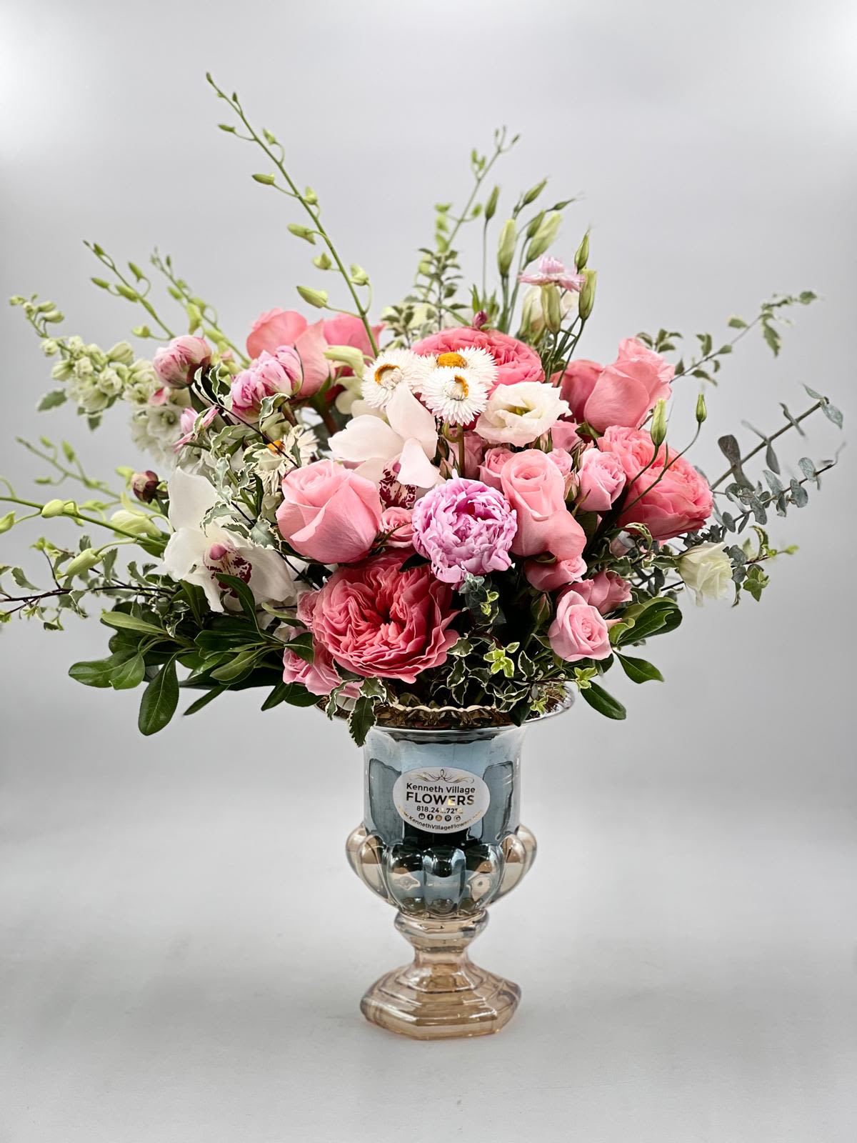 Pink and white mixed bouquet in a glass vase