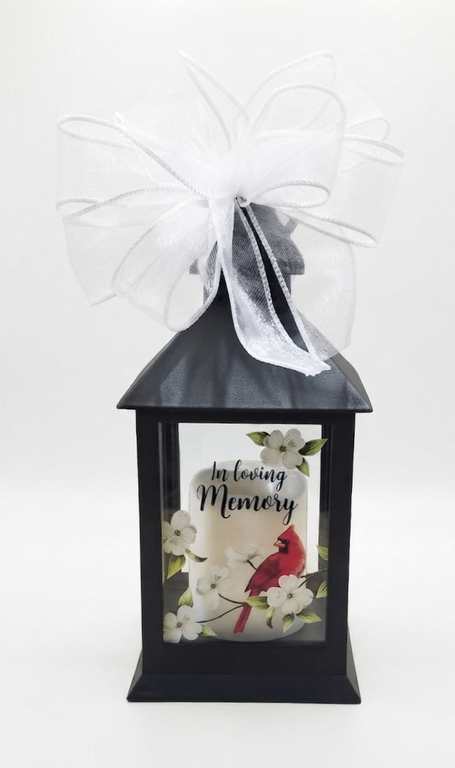 Black memorial lantern with a white bow and "In loving Memory" design
