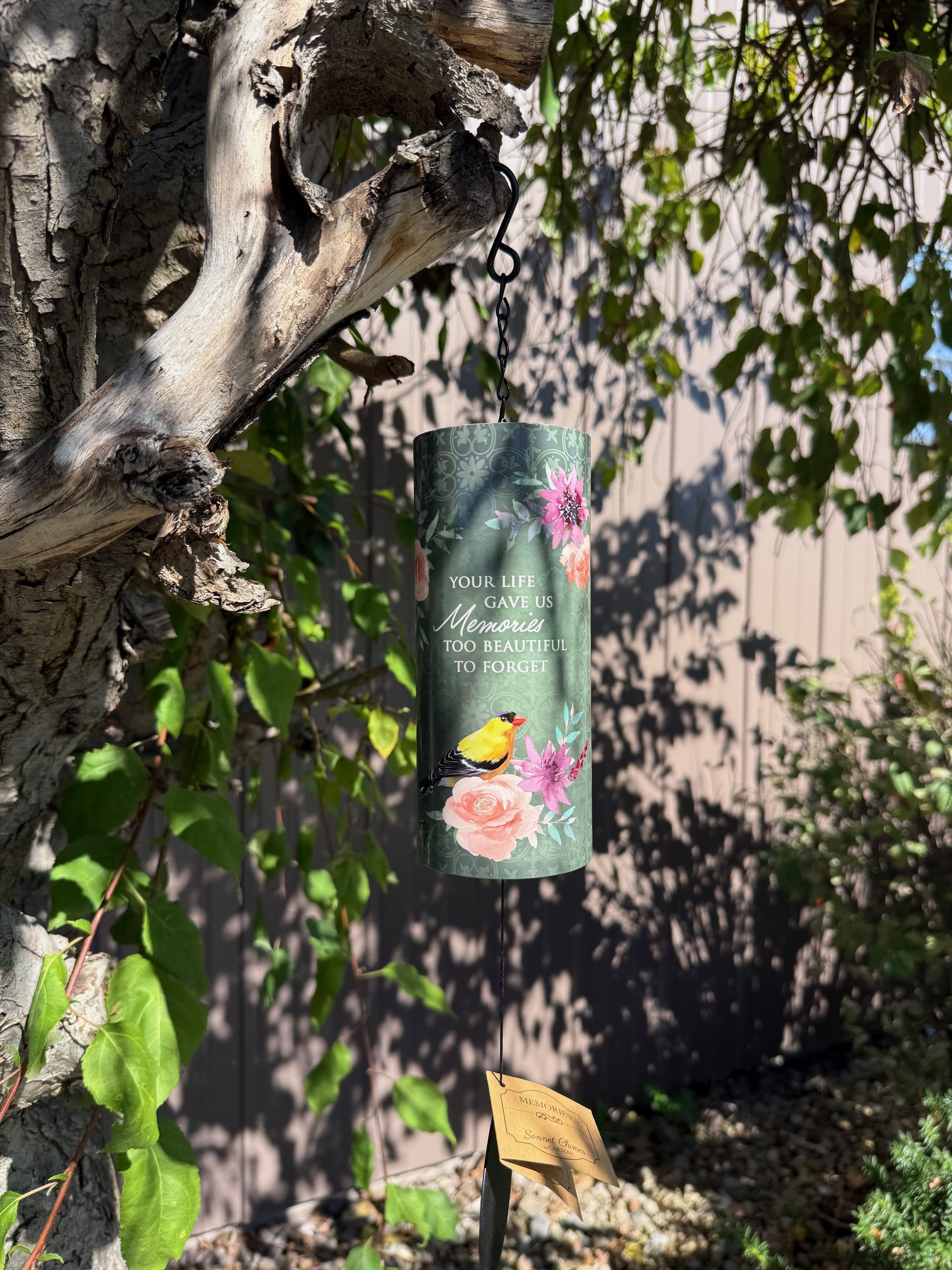 Hanging memorial wind chime with floral and bird design