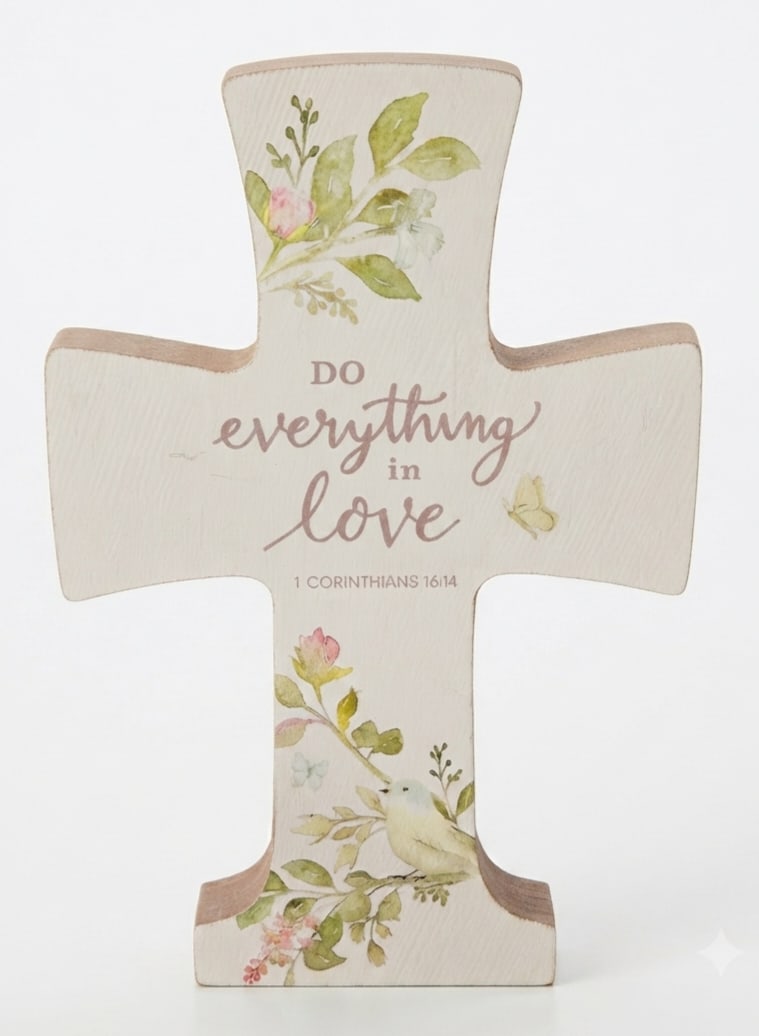 Decorative cross plaque with floral print and the words "do everything in love"