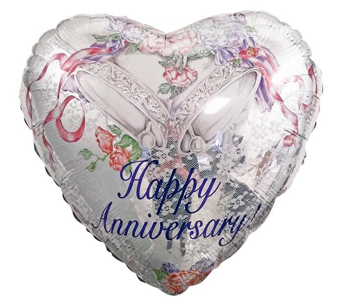 Heart-shaped foil balloon with "Happy Anniversary" text and floral print