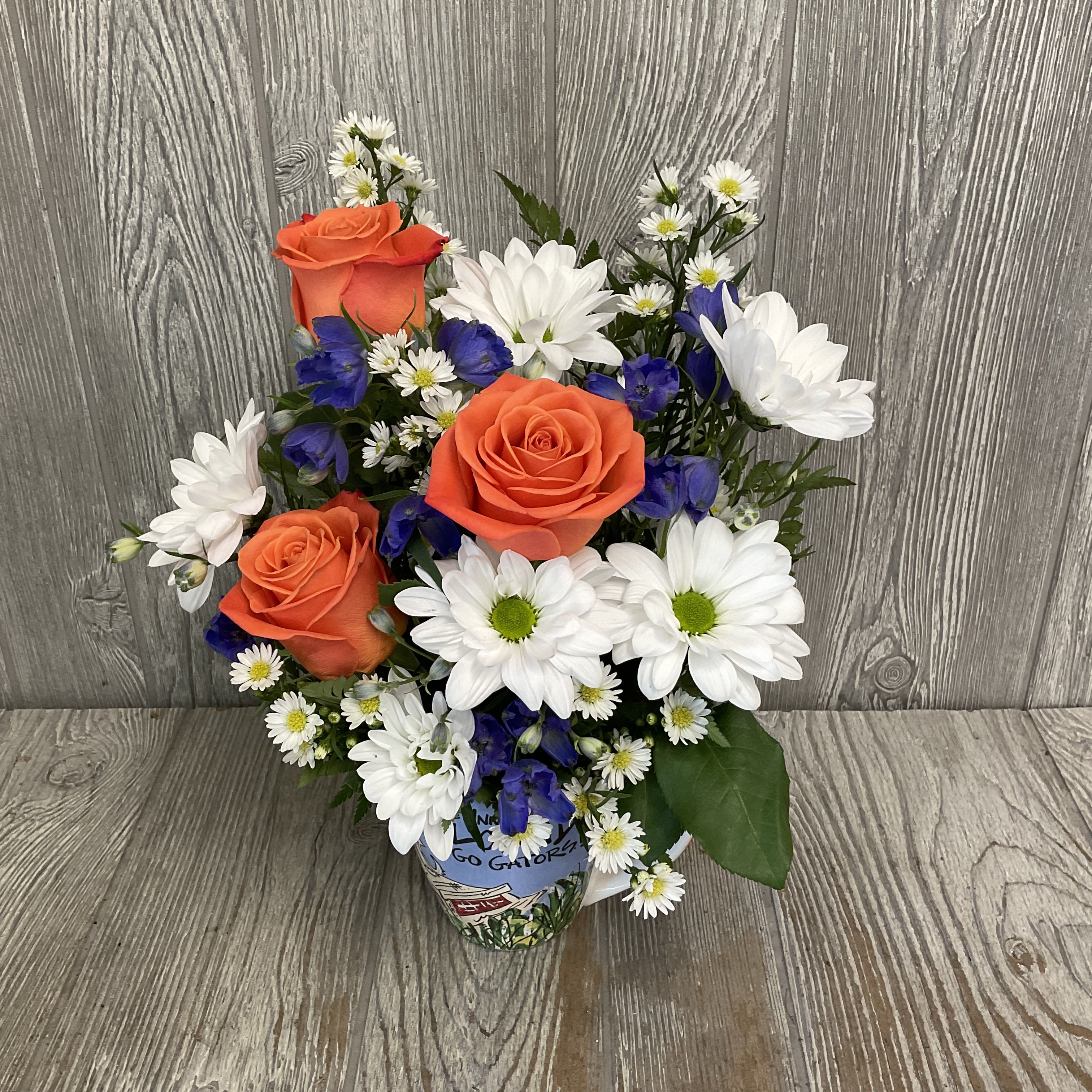 Gator Artwork Flower Mug - Mixed flowers in a keepsake ceramic Gator artwork mug. Flowers may vary. 