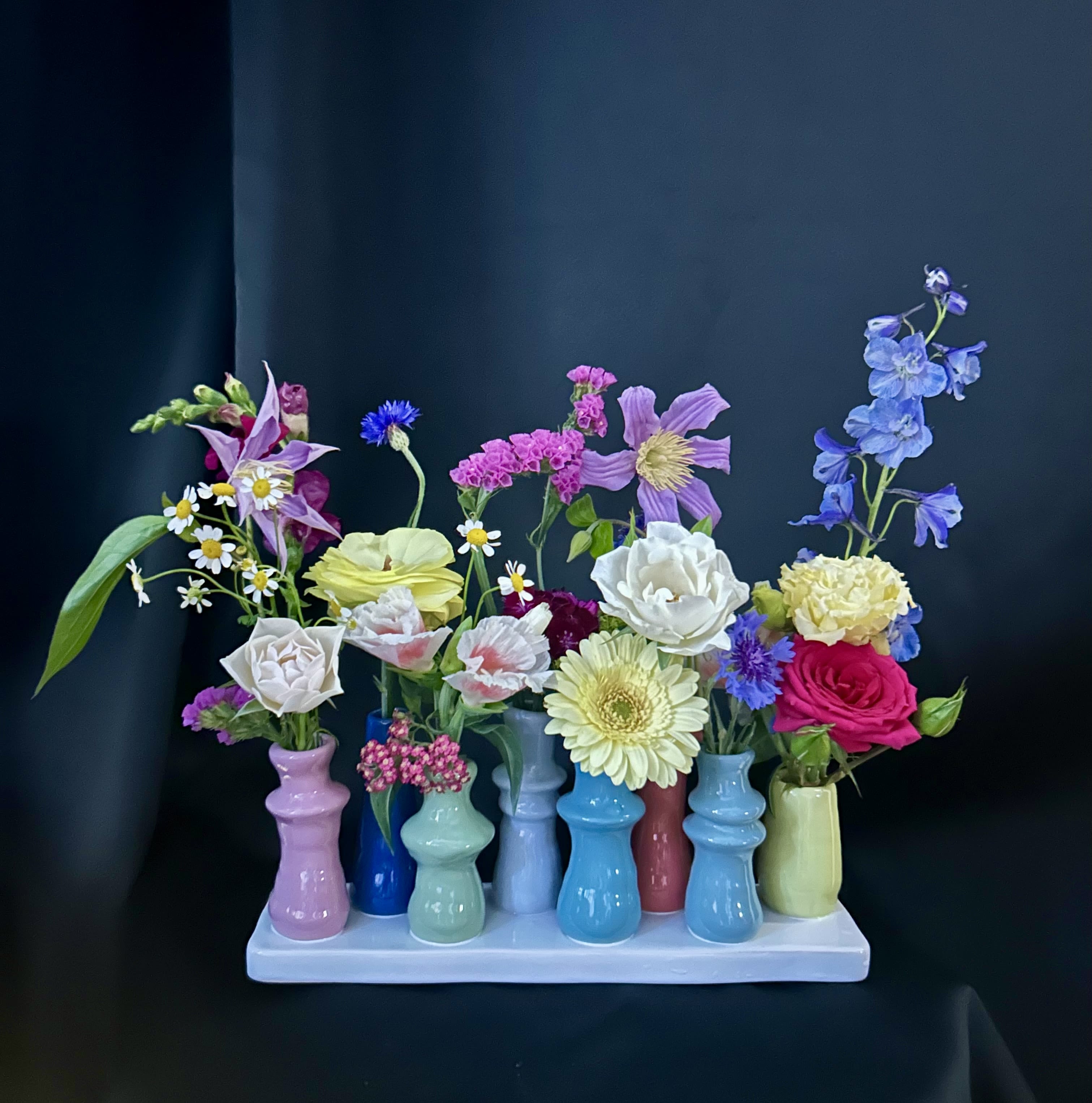 Windowsill Bud Vase (Available for Subscription) - ***New Offering!  **While Supplies Last! Who wouldn't want to receive this sweet little tray of colorful bud vases (one piece) to brighten up their windowsill, or any other surface for that matter! Initial order includes seasonal, colorful stems for the recipient. "Refills" are available for $40. Call ahead and we can arrange to fill your vessel while you wait, or simply drop off and schedule a delivery (delivery rates will apply). Special requests? Call us and we will try to oblige! 