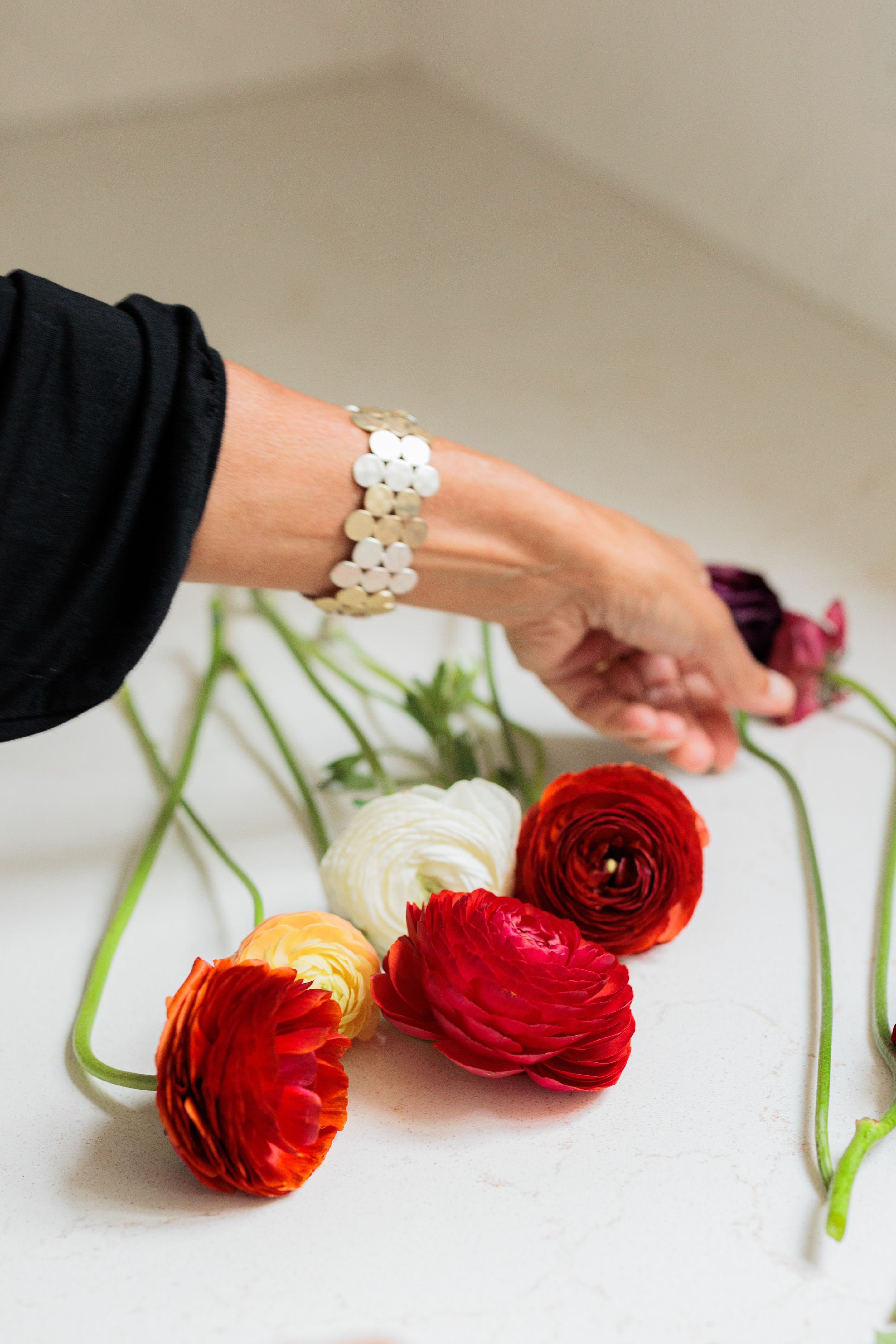 Petite Fleur Édition - A Designer’s Choice Floral Arrangement  A refined, petite composition designed with our signature approach to balance, movement, and restraint. Each arrangement is created using a curated selection of the freshest seasonal blooms available, resulting in a one-of-a-kind design that feels elevated and intentional.  This collection is thoughtfully scaled for smaller spaces and subtle gestures—perfect for those who appreciate beauty in a more understated form. While compact in size, each piece reflects the same design standards and care as our larger arrangements.  As a designer’s choice offering, colors, blooms, and vessel will vary, allowing our team to select the most beautiful elements available each day.  Available through our luxury florist in DeLand, serving Lake Mary, Sanford, Deltona, and surrounding Central Florida areas. All designs are created by appointment only, with convenient phone and online ordering.  Place your order today and enjoy a beautifully composed floral piece, thoughtfully designed for refined, everyday moments.