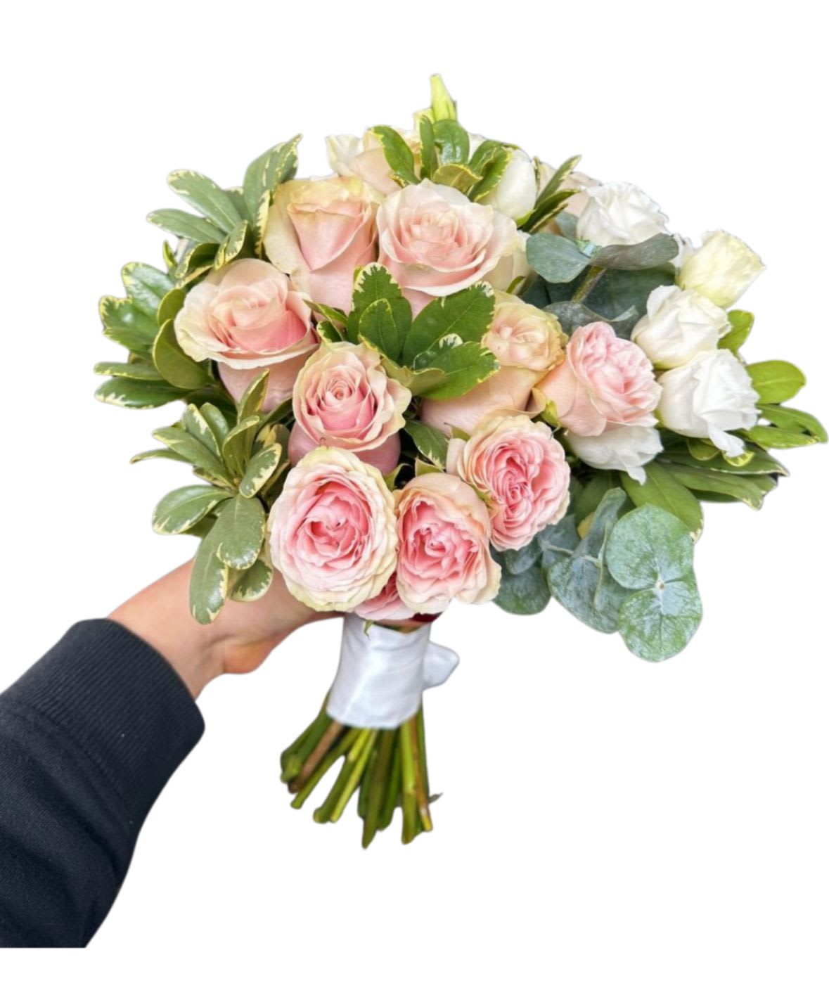 Blush bride - A timeless classic bridal bouquet featuring soft pink roses and fresh seasonal greenery, hand-tied into a clean, elegant shape. Finished with a satin ribbon for a romantic look that fits everything from City Hall weddings to traditional ceremonies.  Note: Pink tone and greenery may vary slightly based on seasonal availability while keeping the same style and value.