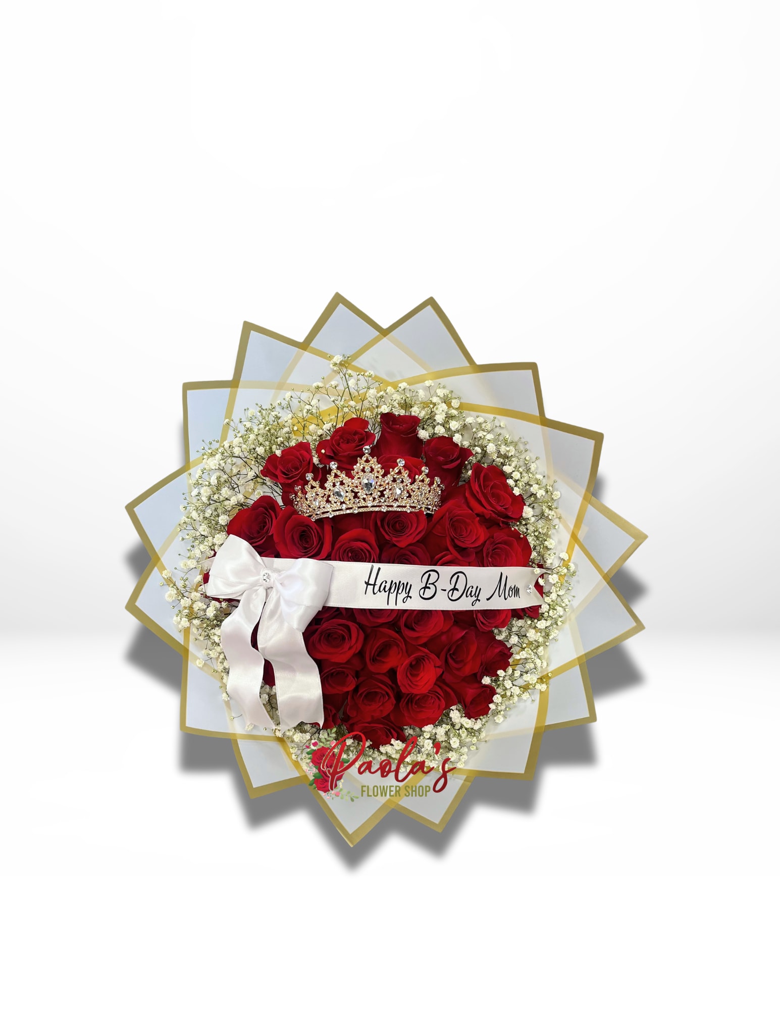 Heart-shaped bouquet of red roses with a crown and white ribbon