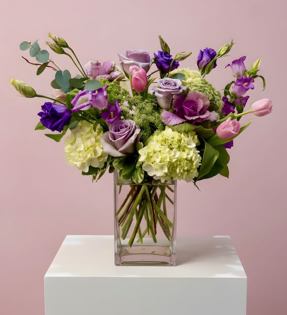 Amethyst Garden Mood - A lush blend of hydrangeas, lisianthus, roses, and seasonal blooms, thoughtfully arranged with layered textures and garden-style movement, inspired by the beauty of amethyst quartz.