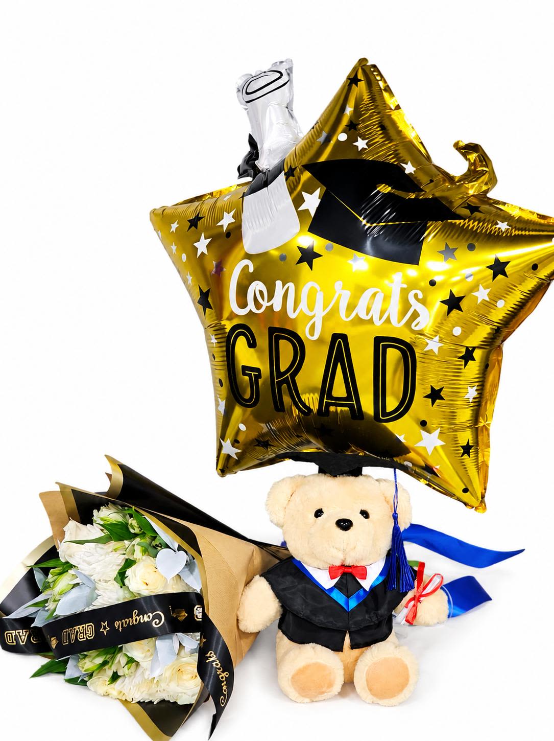 Graduation Combo - Celebrate your graduate in style with this elegant Graduation Gift Set!  This all-in-one arrangement includes a plush graduation teddy bear, a stunning bouquet of fresh white flowers, and a large gold “Congrats Grad” foil balloon. Perfect for graduation parties, surprise deliveries, or congratulating your loved one on their big achievement.  Includes: • Graduation teddy bear with diploma • Fresh white flower bouquet • Large gold “Congrats Grad” balloon • Beautifully arranged presentation  Perfect for:  High School Graduation  College Graduation  Nurse &amp; Medical School Graduation  Graduation Party Gifts  A thoughtful and memorable gift to make their special day even brighter! 