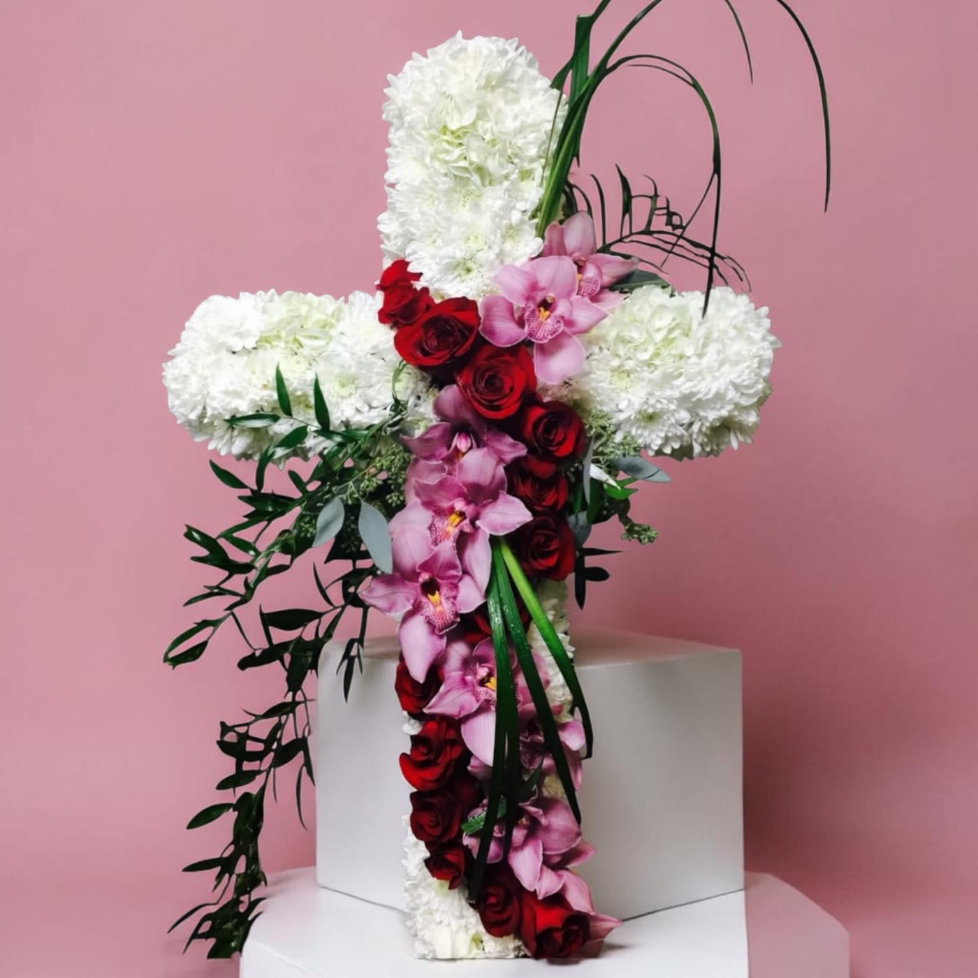 Loving Memories - Cross of mums with incredible spray of orchids or other flowers. 