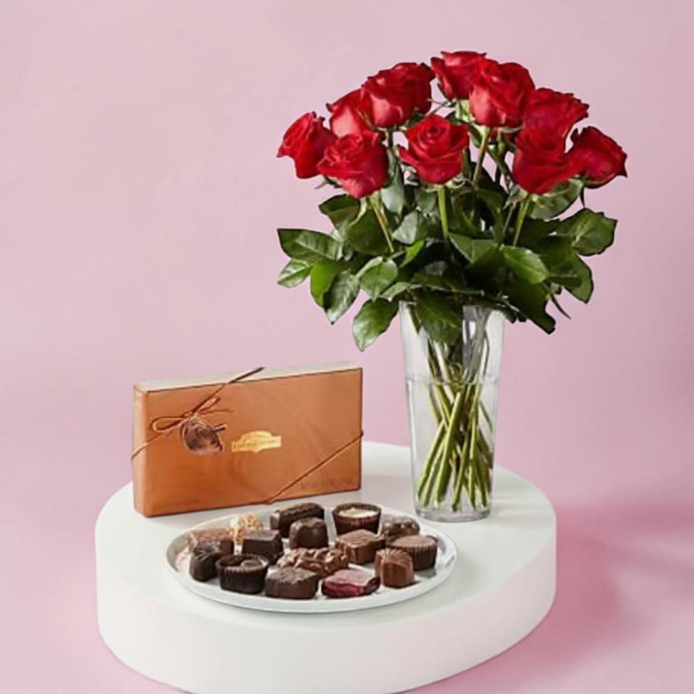 Roses and Chocolate - Wow her with a dozen roses and a box of chocolates!  