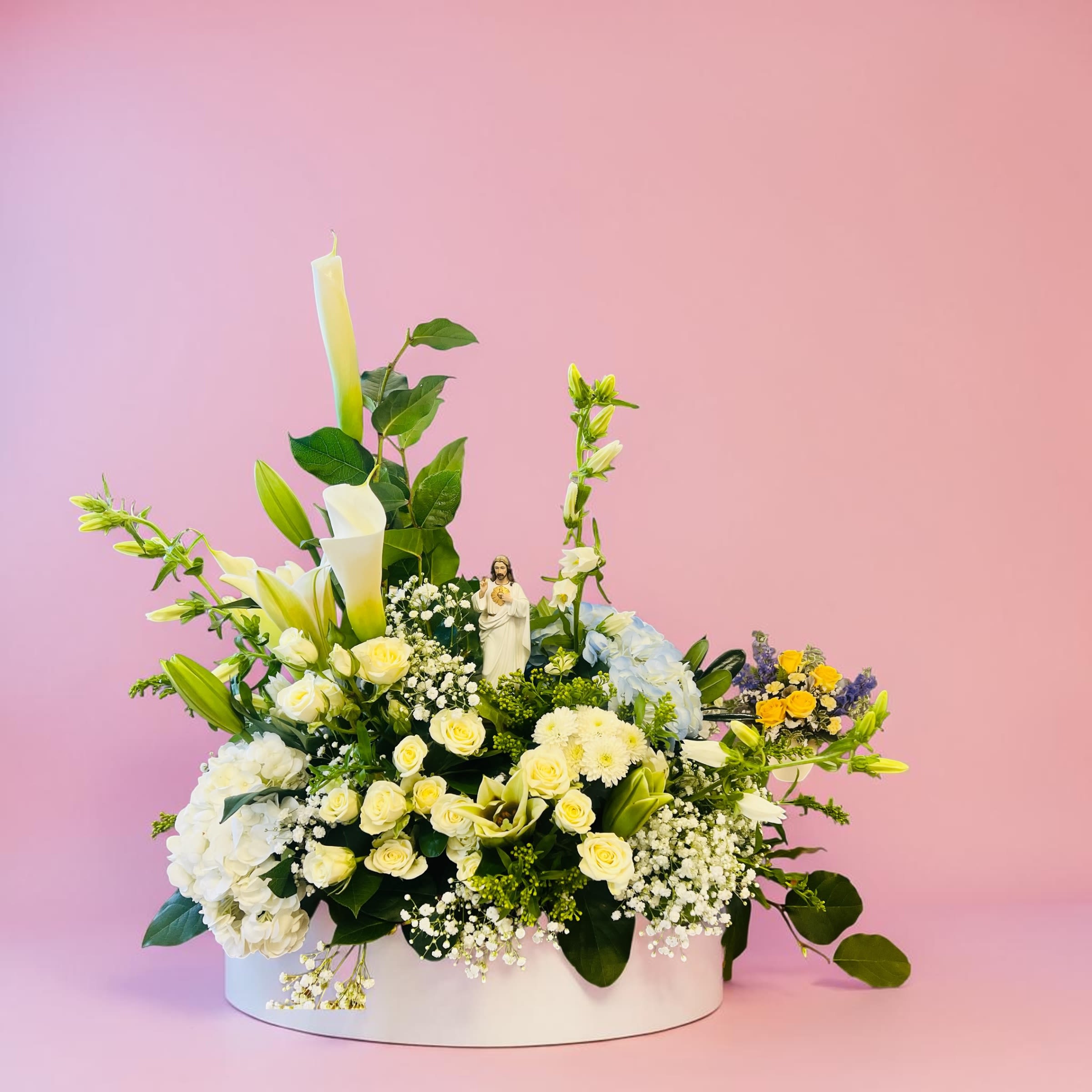 Garden of Eden  - Garden of flowers with statue in middle. Flowers are on a platform in the picture. This will come in a simple utility dish which is unseen.