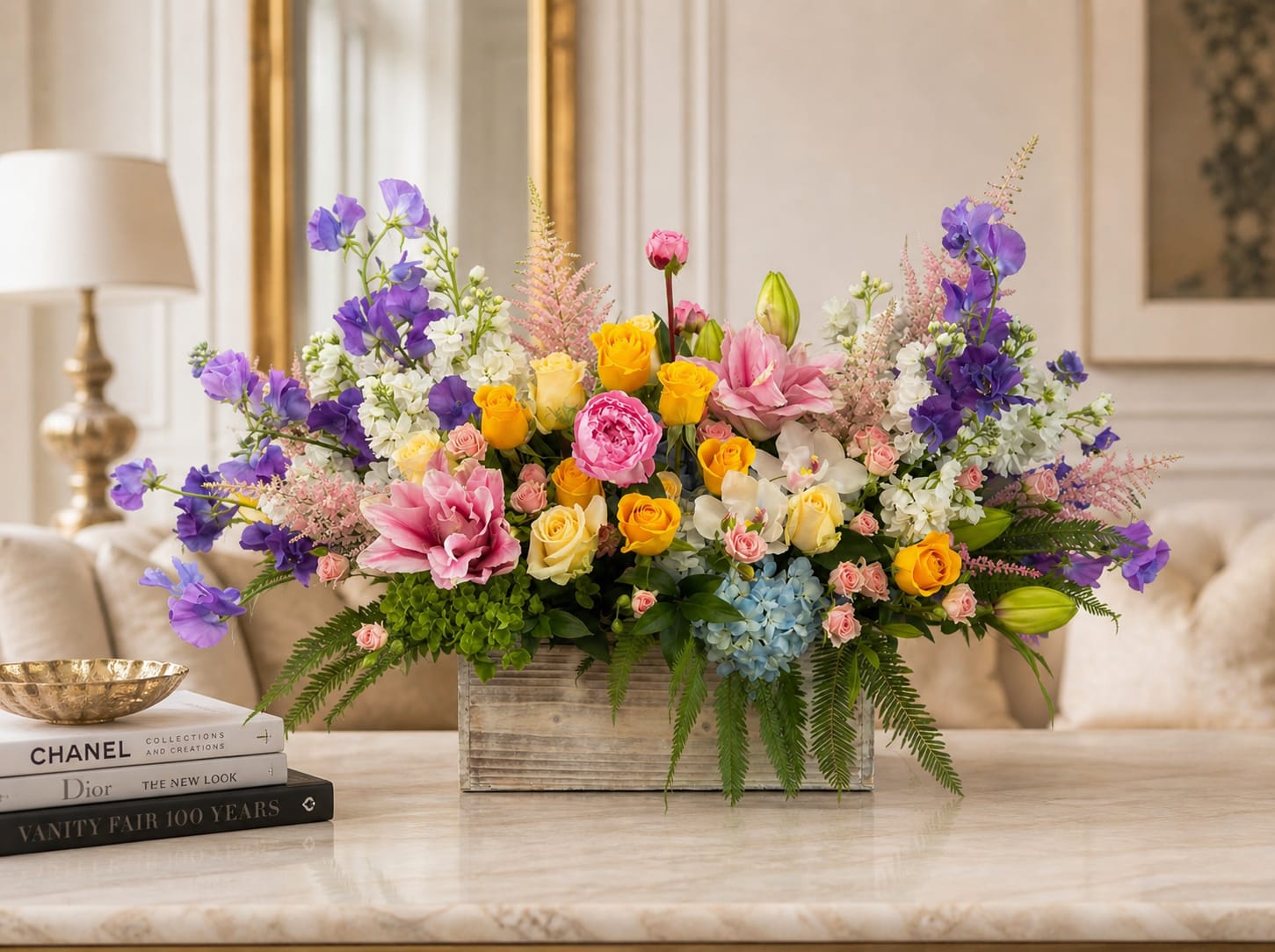Pastel Dream Box - This box has all the colors of a soft pastel spring day. Flowers included in this design are Sweet Peas, Hydrangea, Rose Lilies, Roses, spray roses, Astilbe, Stock, Peonies, Cymbidium Orchids and Umbrella fern.