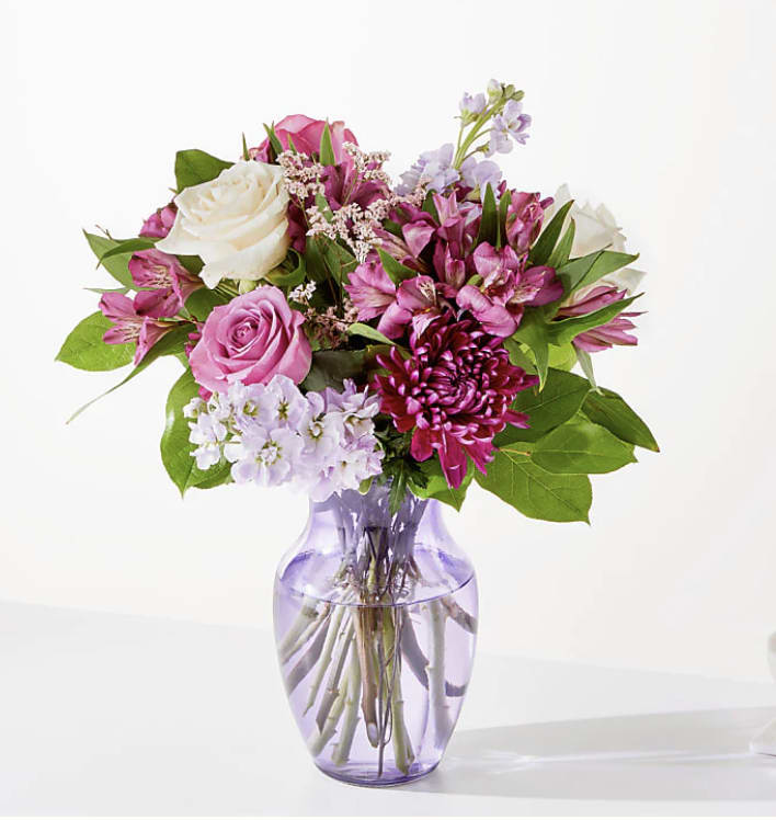 Amethyst  - stock, roses, lemon leaf, and more (shape of vase may vary)