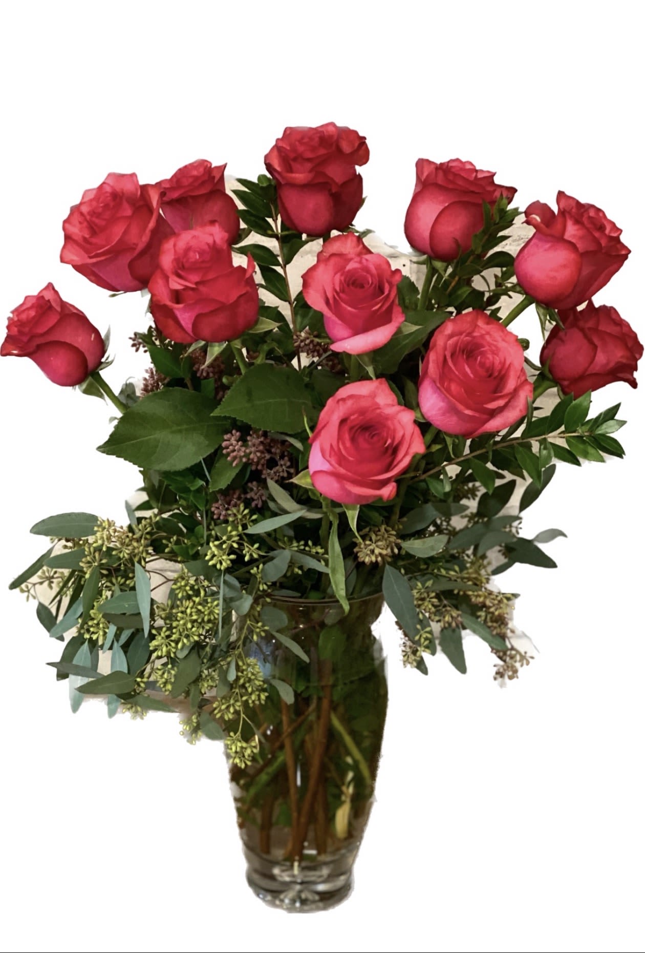 Pink rose bouquet in a clear glass vase