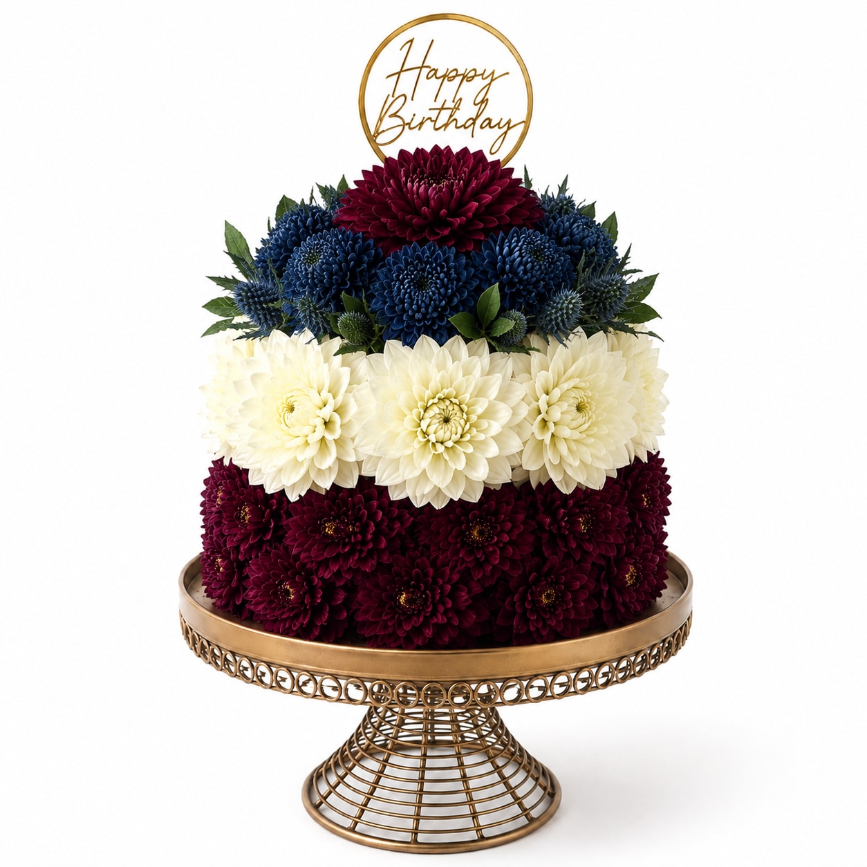 Tiered chrysanthemum arrangement with a gold Happy Birthday topper