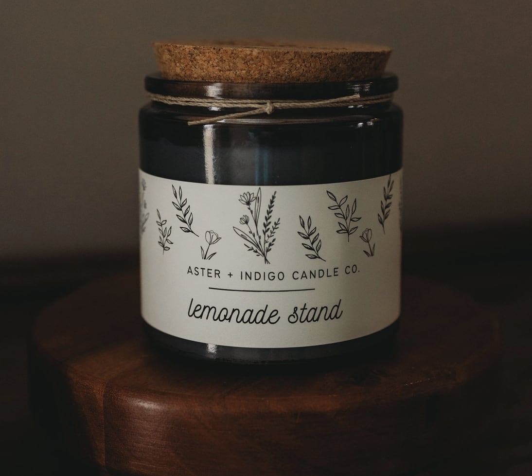 Lemonade Stand Candle - Light up your home with the deliciously sweet and bright aroma of our Lemonade Stand Candle. Bringing together the perfect blend of citrus, floral, and sweet notes - making it the perfect addition to any room.  | Made with 100% USA grown soy, phthalate-free/Prop 65 compliant fragrances + lead/zinc free cotton wicks | 12oz filled weight | Approx. burn time - 60 hours