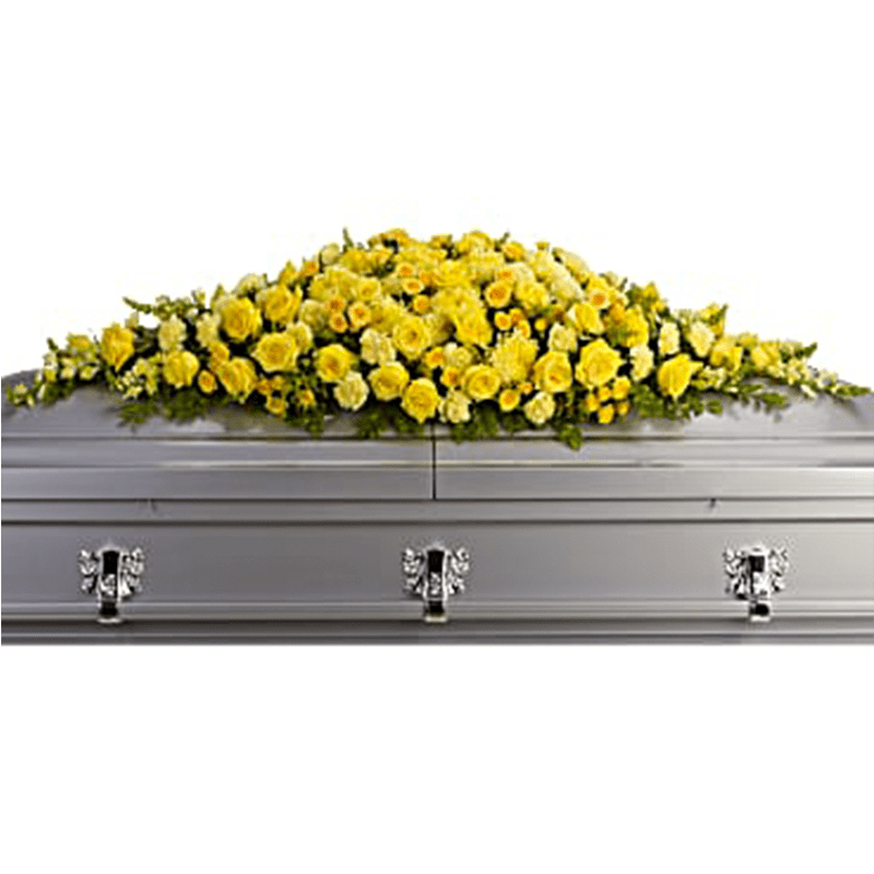Yellow floral casket spray on a gray casket