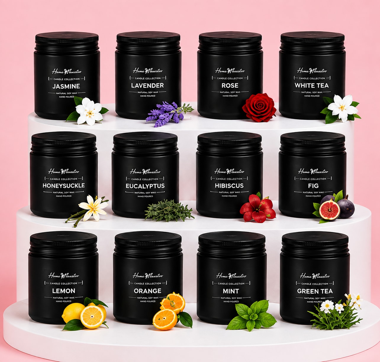 Set of black scented candles on white risers with small floral accents