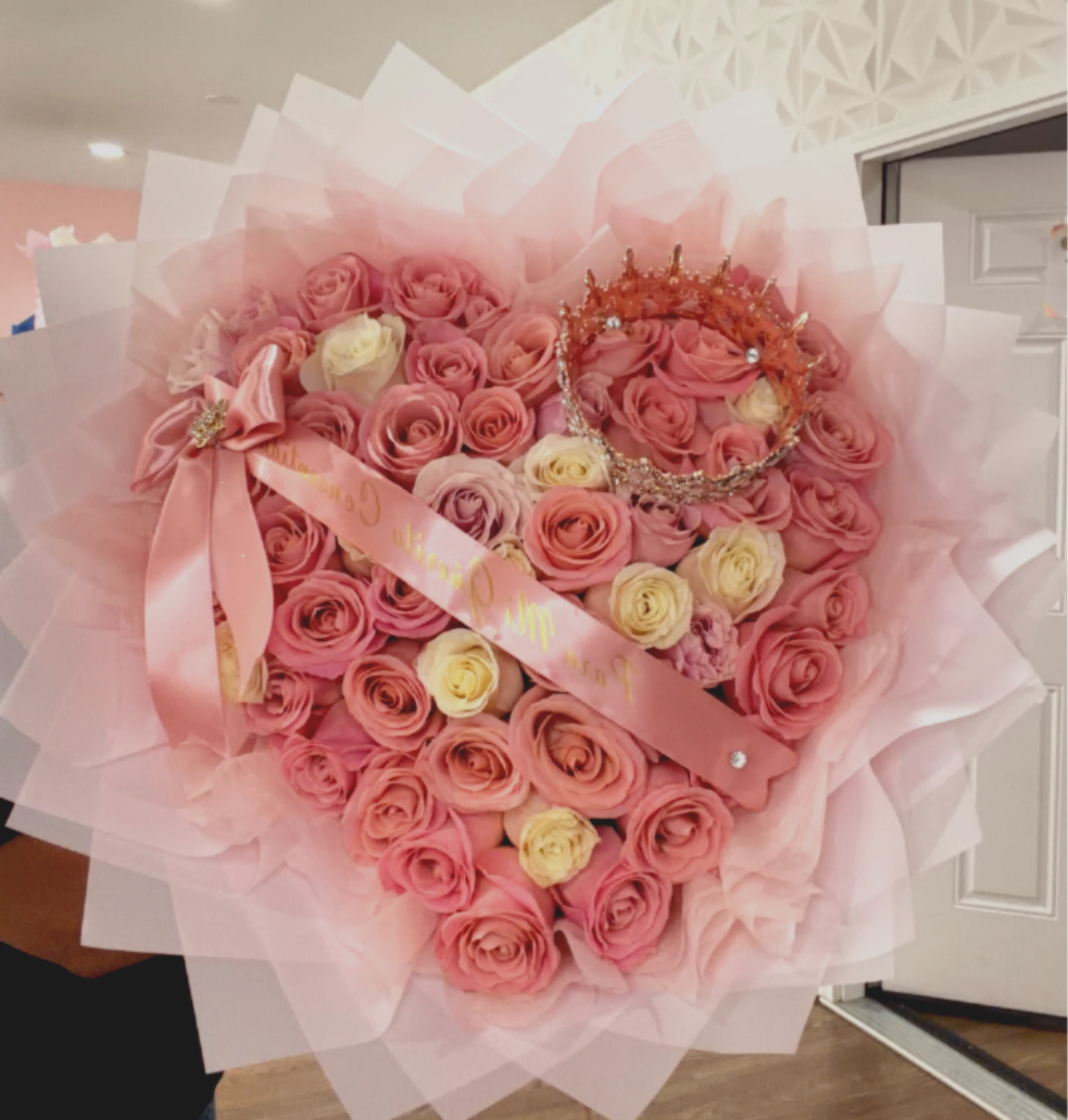 Blushing Heart Bouquet - Make an unforgettable impression with this breathtaking heart-shaped bouquet, featuring 50 premium pink and white roses carefully arranged to create a romantic and elegant design. 