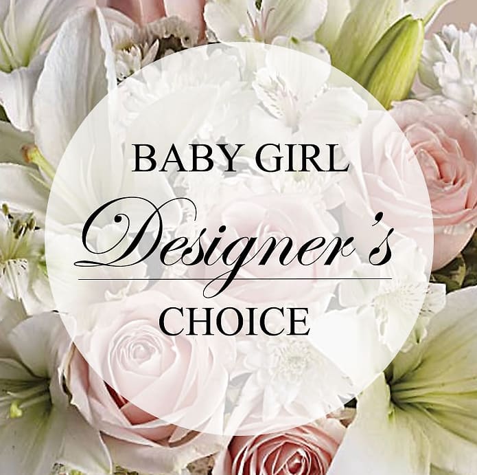 White and pale pink floral arrangement with lilies and roses