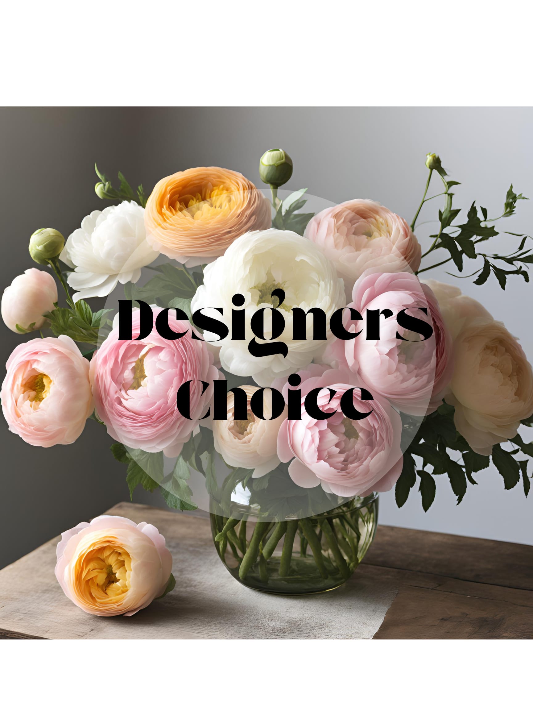 Bouquet of pastel ranunculus in a glass vase