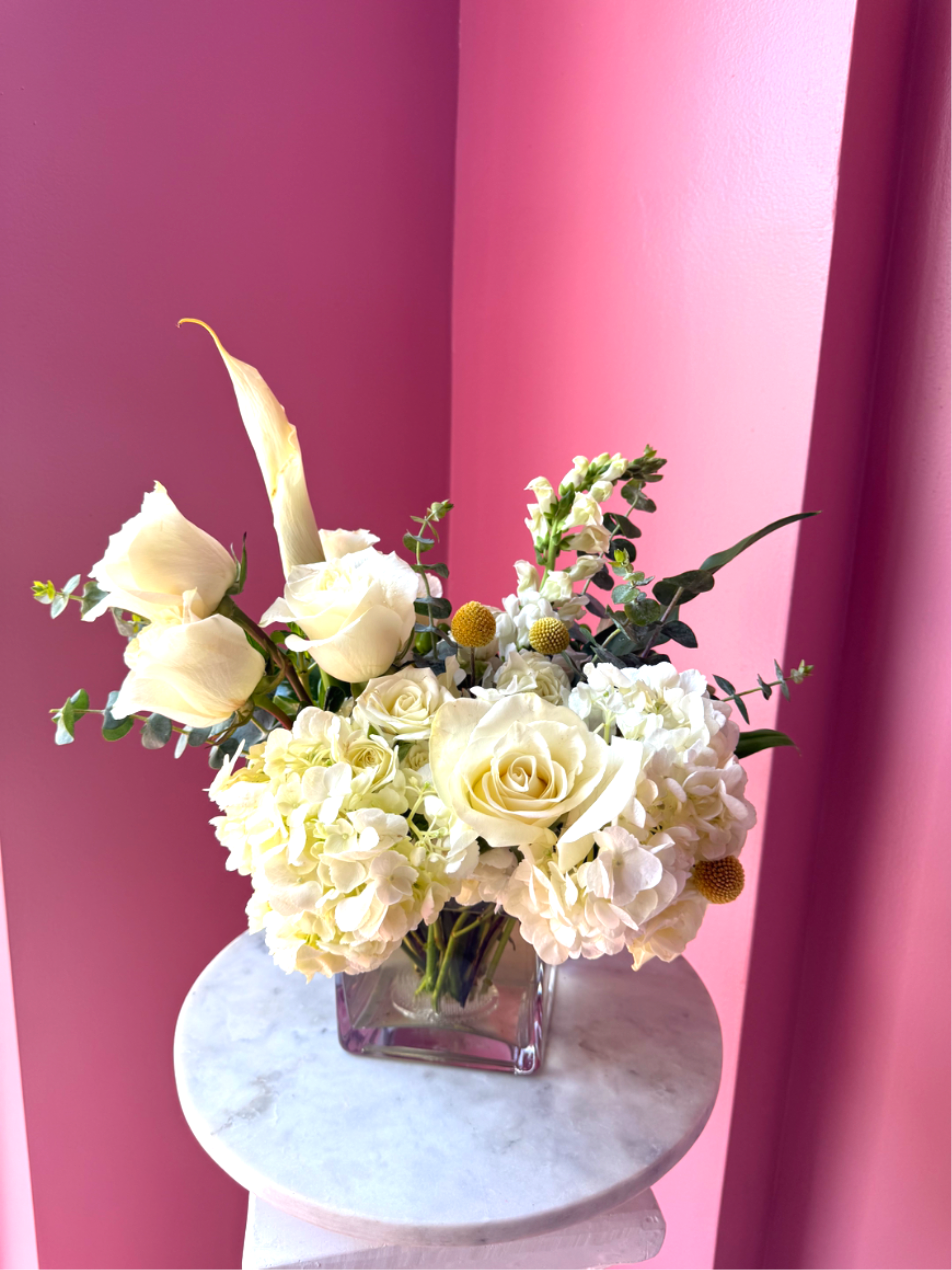 Cloud Nine by Evergreen Elegance - New beginnings deserve flowers! This all white arrangement includes roses, lisianthus and hydrangeas. Cloud Nine by BloomNation™ is the perfect gift for celebrating a new year, a new baby, or a newly married couple.   APPROXIMATE DIMENSIONS 15" W X 13" H
