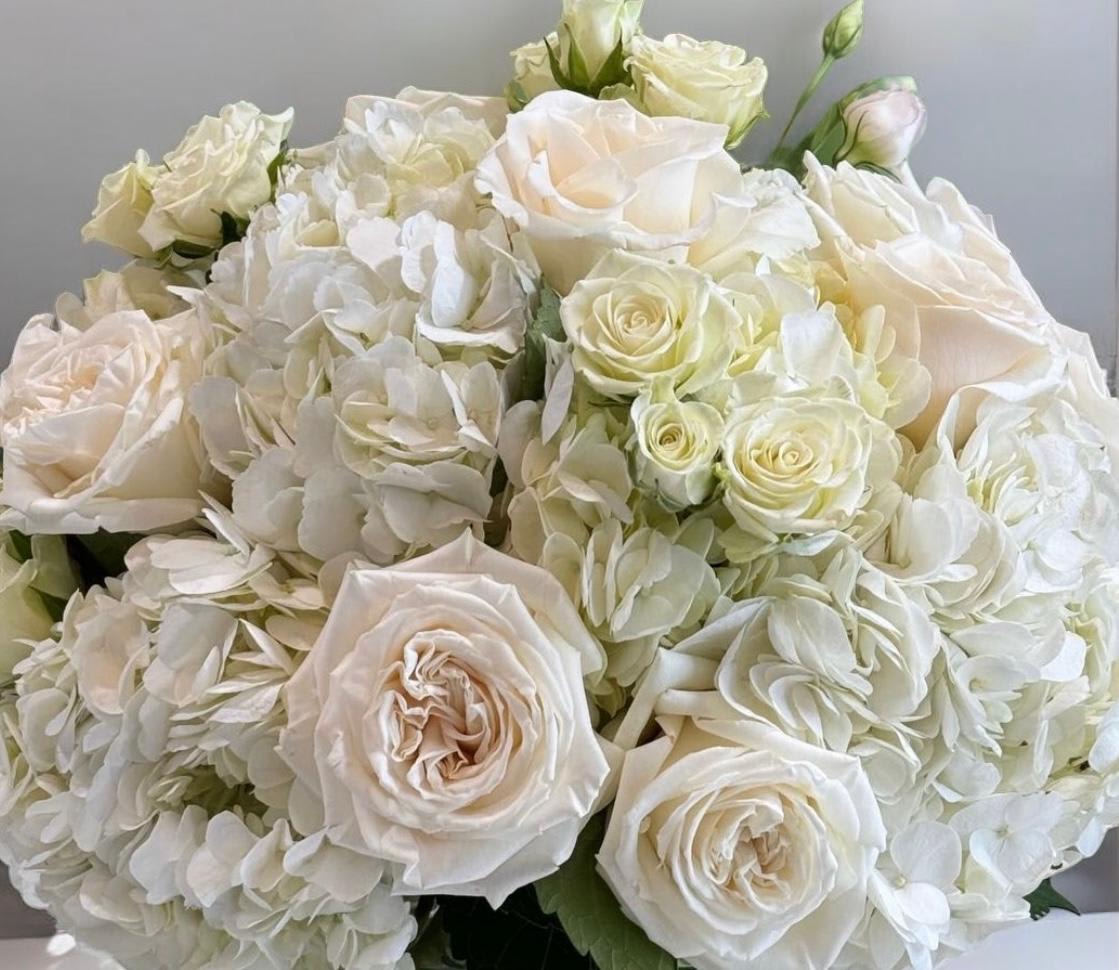 Bouquet of white roses and white hydrangeas