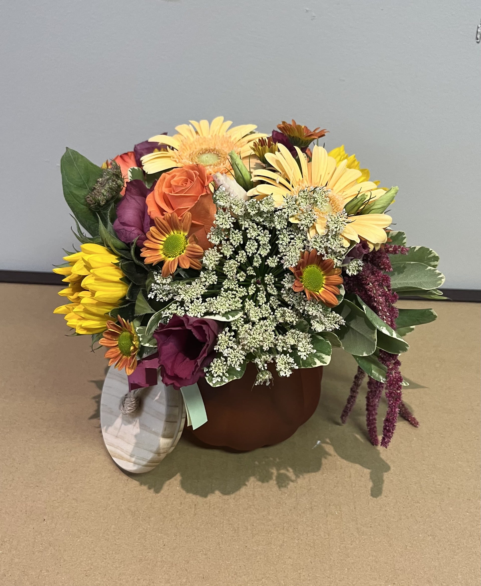 Autumn Twist by Chasing Petals - A low centerpiece style arrangement perfect for a coffee table, front entrance or dining table. This little cutie makes a wonderful hostest with the mostest gift!