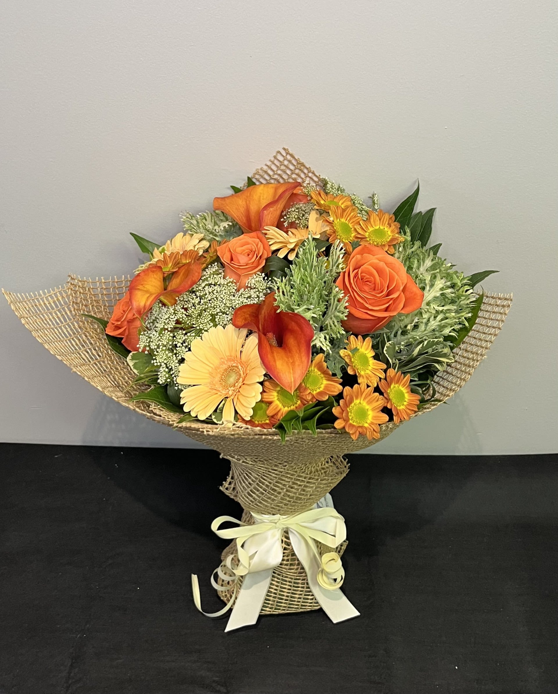 Orange Crush by Chasing Petals - Set the world on fire with this bold bouquet! It's like a fall sunset in flower form.