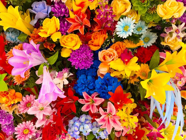Vibrant Designer's Choice Wrapped Bouquet by Chasing Petals - A unique selection of vibrant coloured flowers selected by our designer and tastefully arranged in a handtied bouquet, ready to go into your favourite vase!   Please note, flowers will be chosen specifically for each order and will be different each time. If you have specific flower requests please call us to confirm your choices.