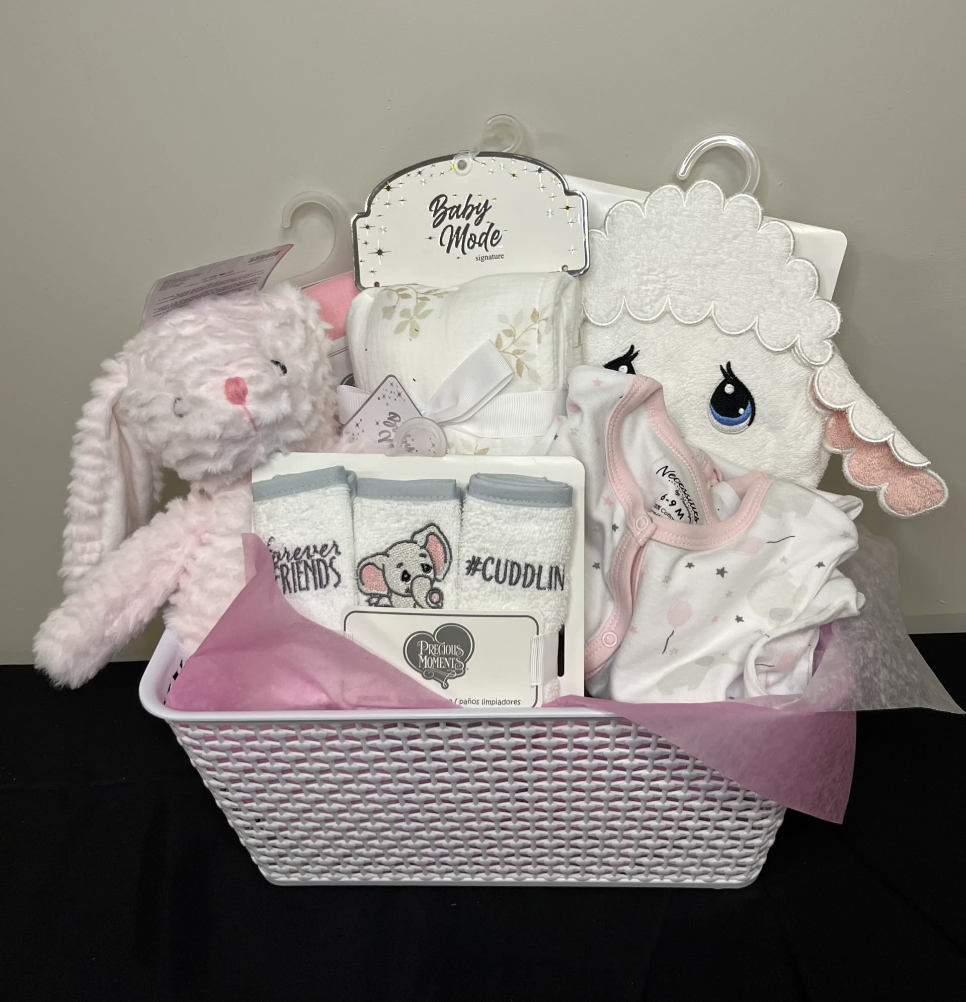 Little Love Baby Basket by Chasing Petals - Baby love in spades with this adorable gift basket.  Available to be customized by gender or gender neutral, shower the little one in cozy comforts - and give Mom and Dad a hand - with hooded towel, blankets, a plush stuffy &amp; outfits in a variety of sizes from 3-12 Months. Fully customizable to your taste in colour, sizes and if you have any special requests we will do our best to accommodate.   *Please allow for 1-2 business days to fill this order as we make them up custom*