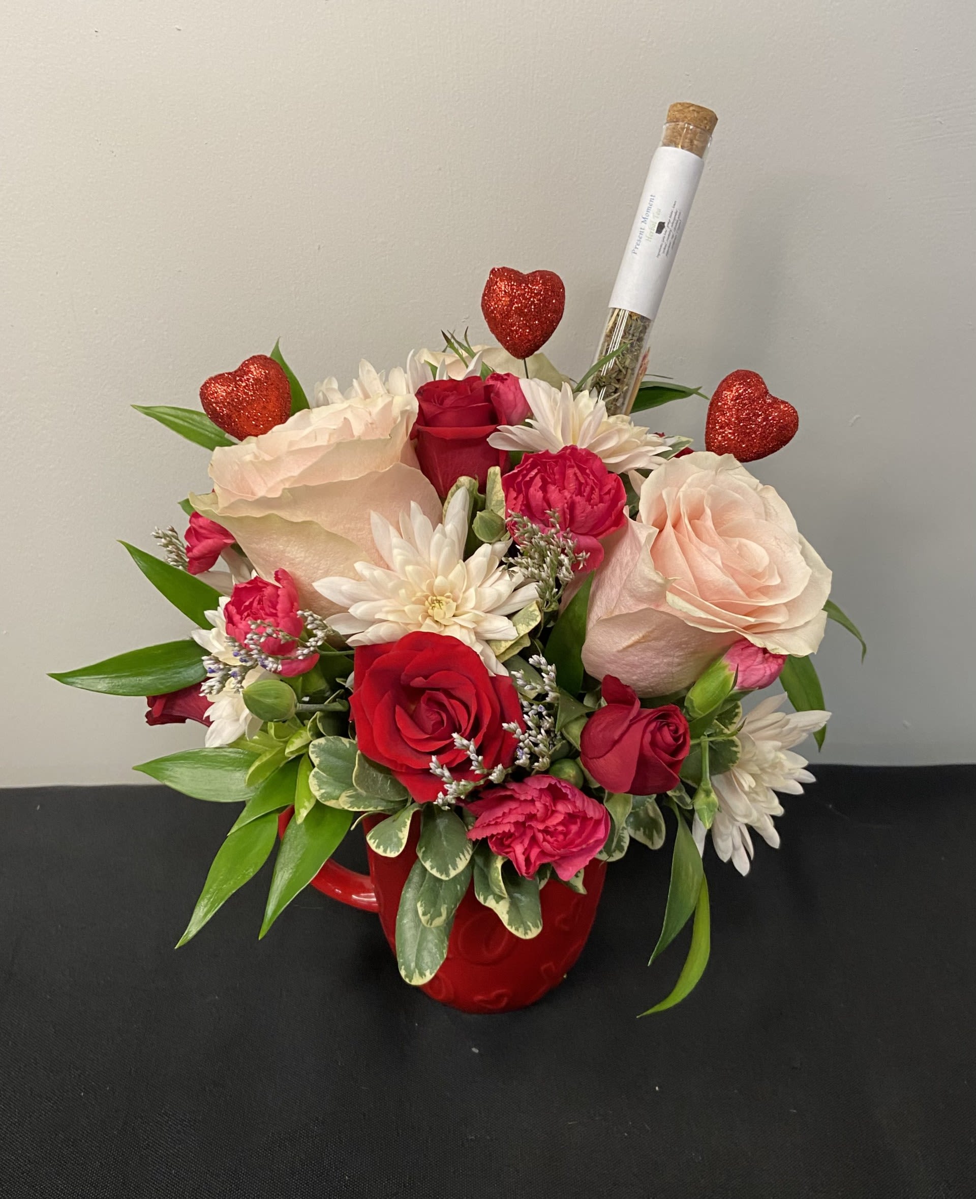 Steeped in Love by Chasing Petals - Steeped in Love is a sweet blend of lush blooms and heartfelt charm, designed to make someone feel extra special. Each arrangement comes with a curated sample of tea from local favourite Celena Tea - because love, like a good cup of tea, is best enjoyed slowly.