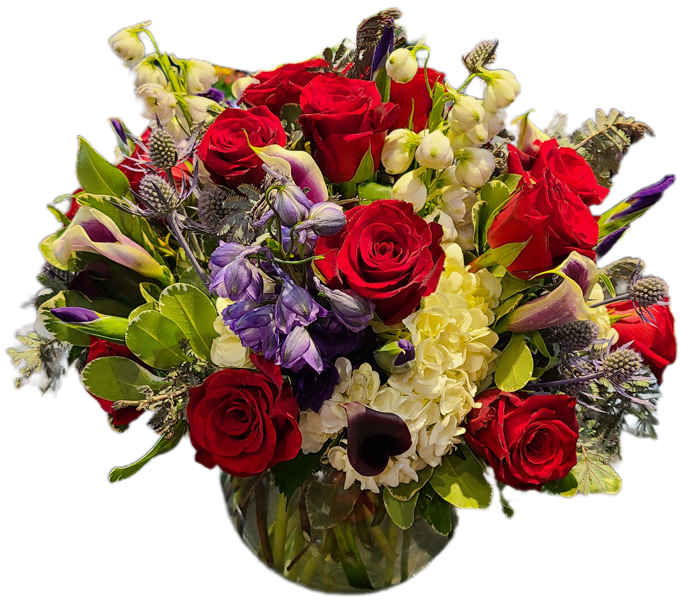 Red Hat Society - A beautiful arrangement featuring purple and red florals. 
