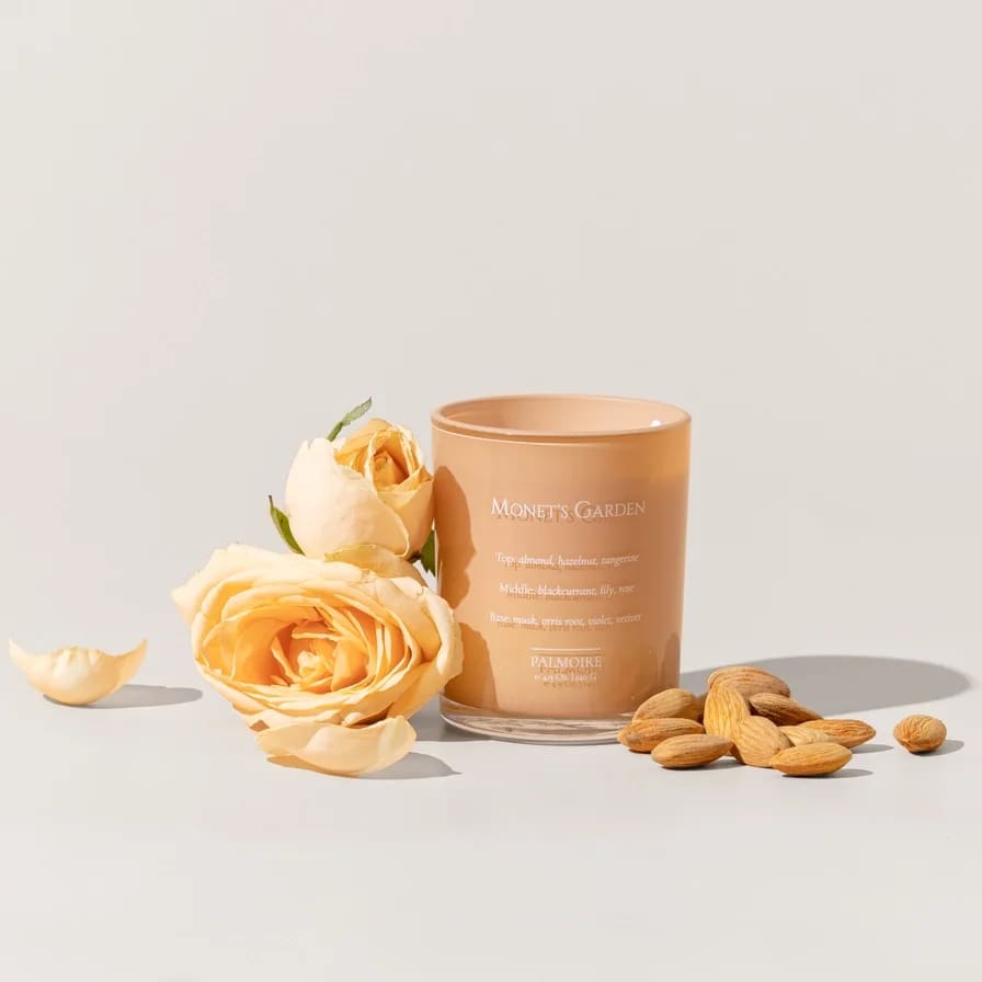 Monet's Garden Soy Wax Candle Set  - *Only the 2.3oz has gemstones inside the candle *Our tester has the same size and package as the original product  Flowers are dancing under the vibrant sunny hue, a jubilant fiesta of romantic aroma. Warm notes of almond and hazelnut embraced by soft flower pedals that rest on a bed of powdery musk.  Top Notes: almond, hazelnut, tangerine Middle Notes: black currant, lily, rose Base Notes: musk, orris root, violet, vetiver