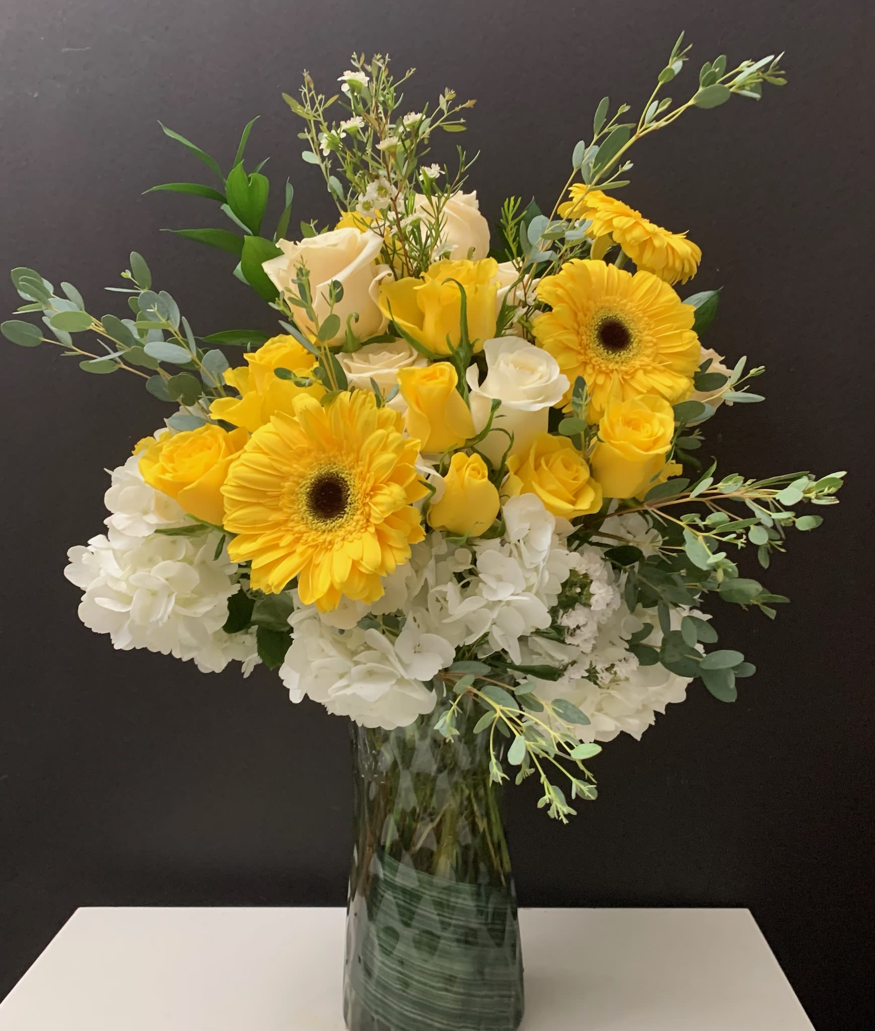 White &amp; Yellow  - Gerberas, Roses, green in tall glass vase 