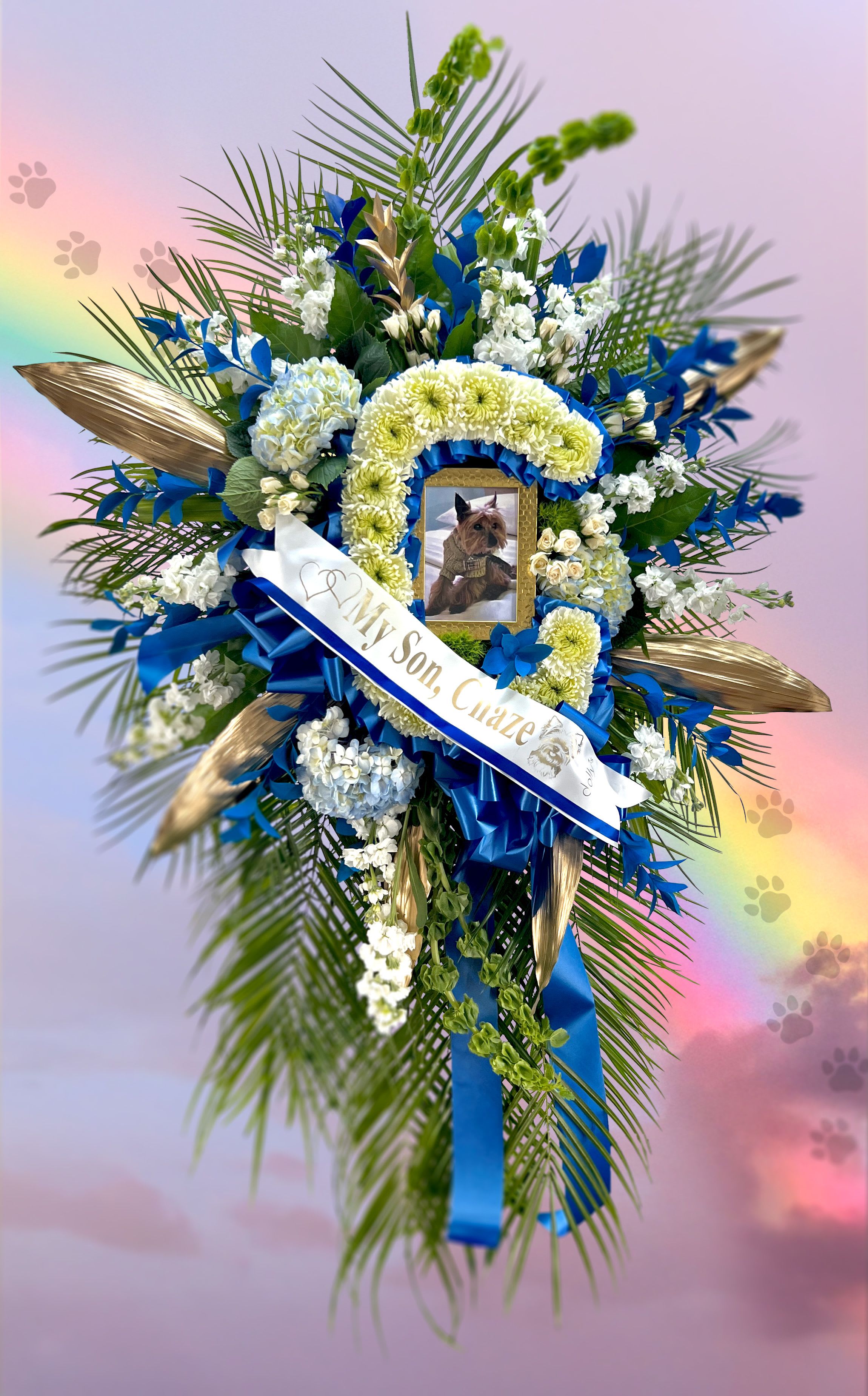 Blue and white funeral wreath with a pet photo and ribbon