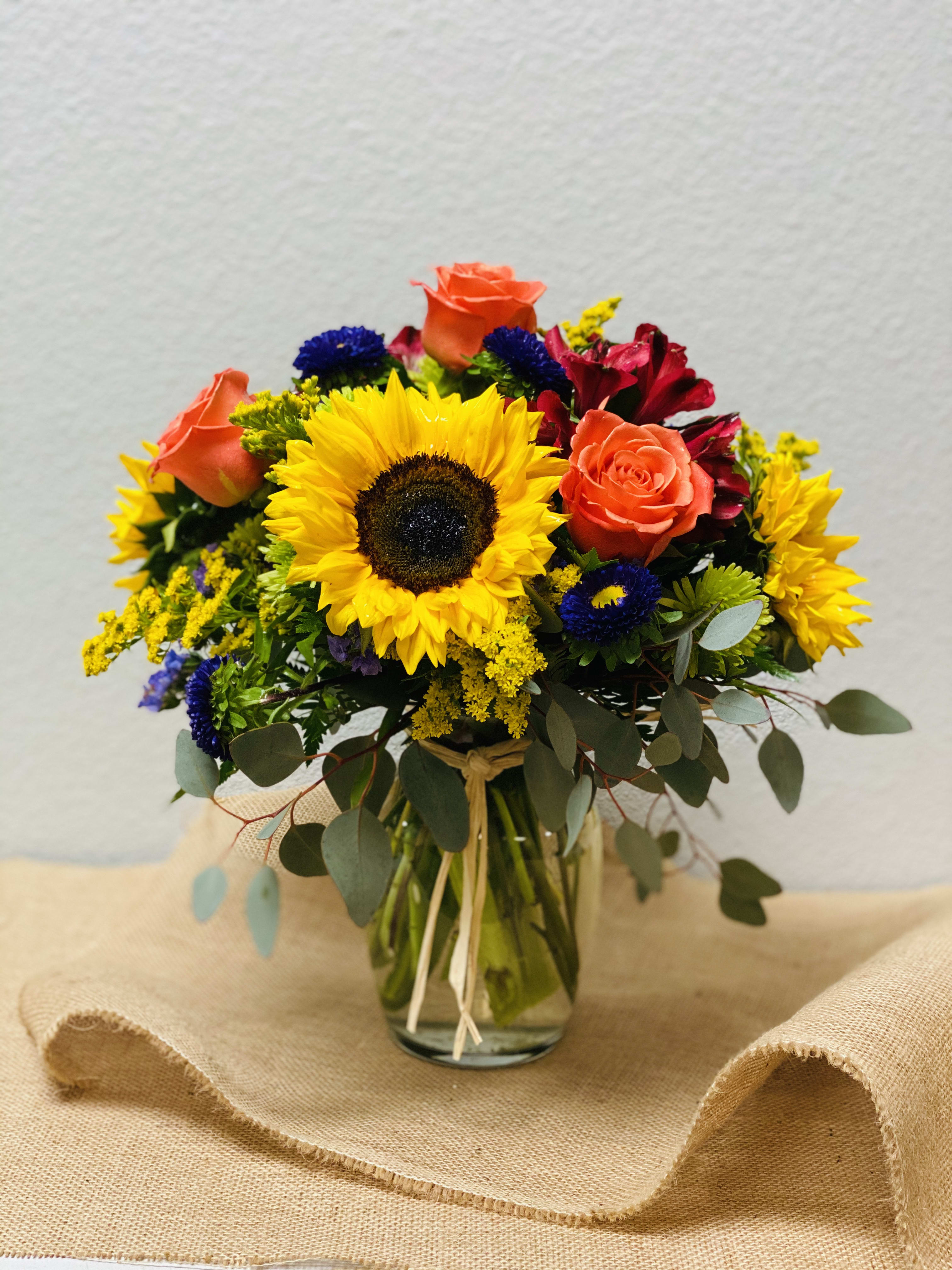 Sunshine  - Beautiful arrangement of Roses and sunflowers.