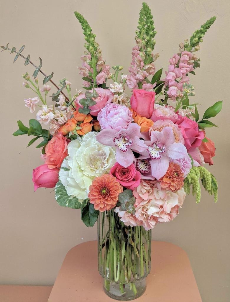 Rainbow Sherbet - This beautiful, tall and full arrangement is perfect for any occasion. It reaches 32" at its tallest point and features premium flowers like peonies, dahlias, garden roses and cymbidium orchids.  