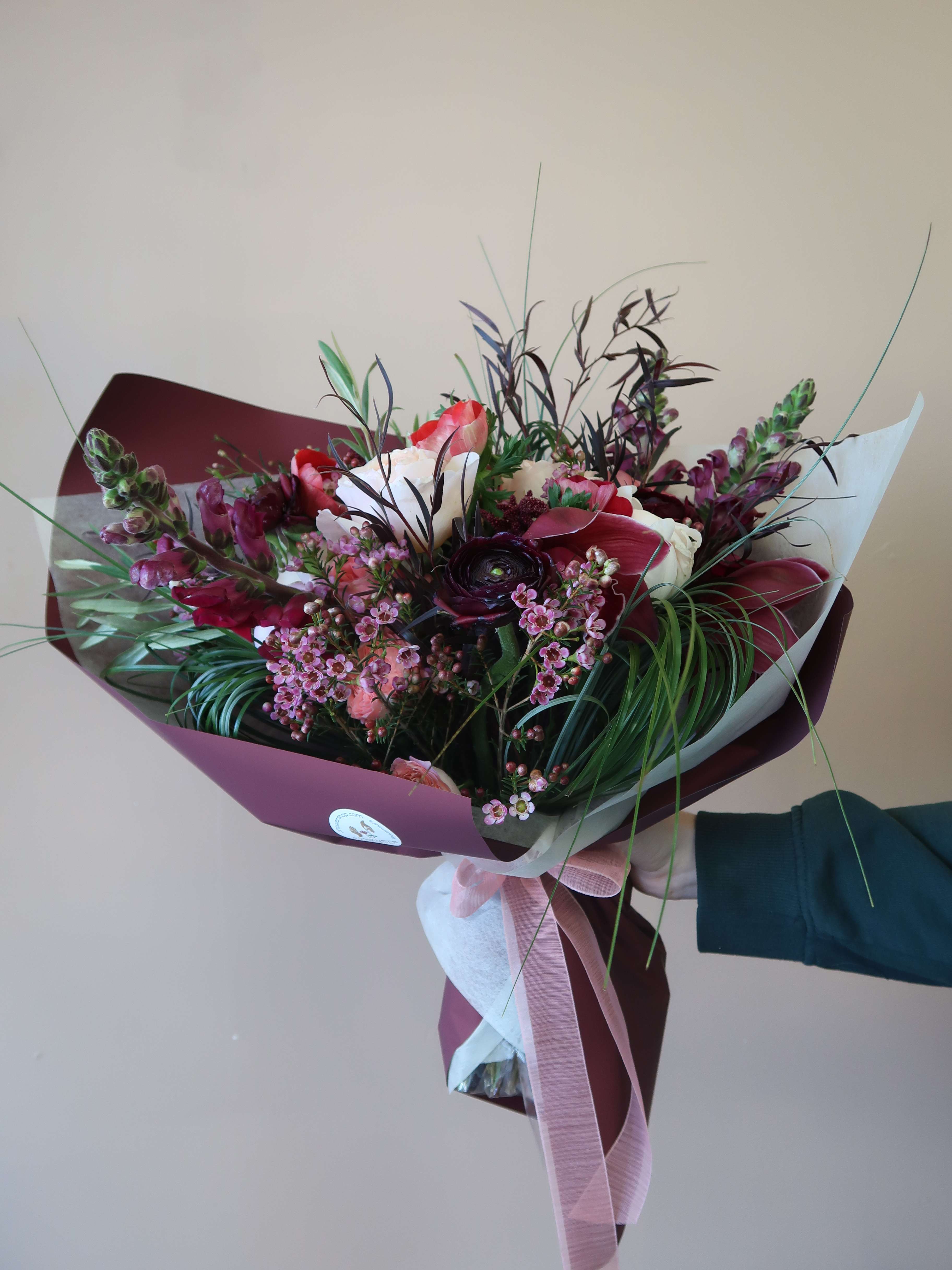 Deeply In Love - "Deeply In Love" was inspired by the deep, moody, but still romantic color pallet of this premium bouquet. The perfect combination of modern and traditional when it comes to a romance bouquet.  