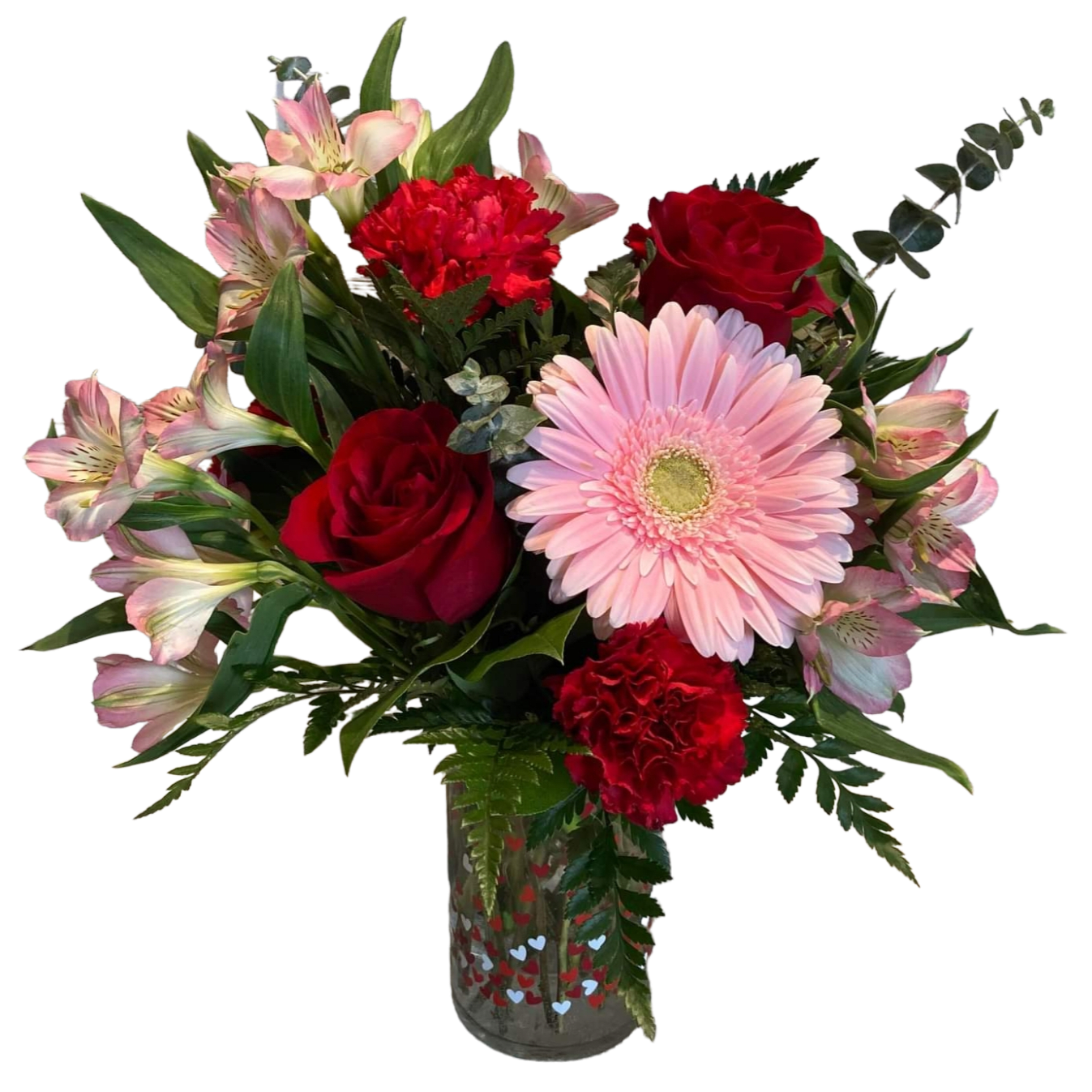 Bouquet of pink and red flowers in a clear vase
