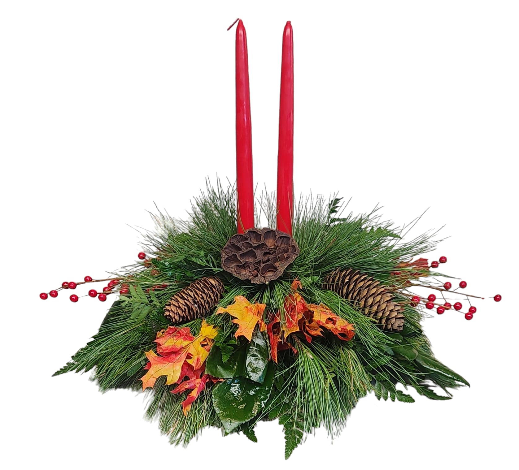 Gather Round - Celebrate Thanksgiving this year with this beautiful centerpiece. 2 tapered Candles, greens, cones, berries and fall leaves set the table for your holiday gathering.