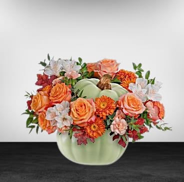Whimsy Pumpkin Bouquet - Whimsy Pumpkin Bouquet offers a stylish option for your autumn table. This sophisticated arrangement of fall roses comes in a beautiful ceramic pumpkin adorned with intricate hand-painted accents in sage green.