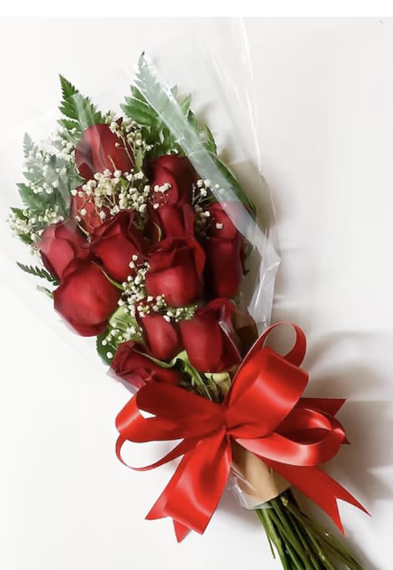 Bouquet of red roses with baby's breath and a red ribbon